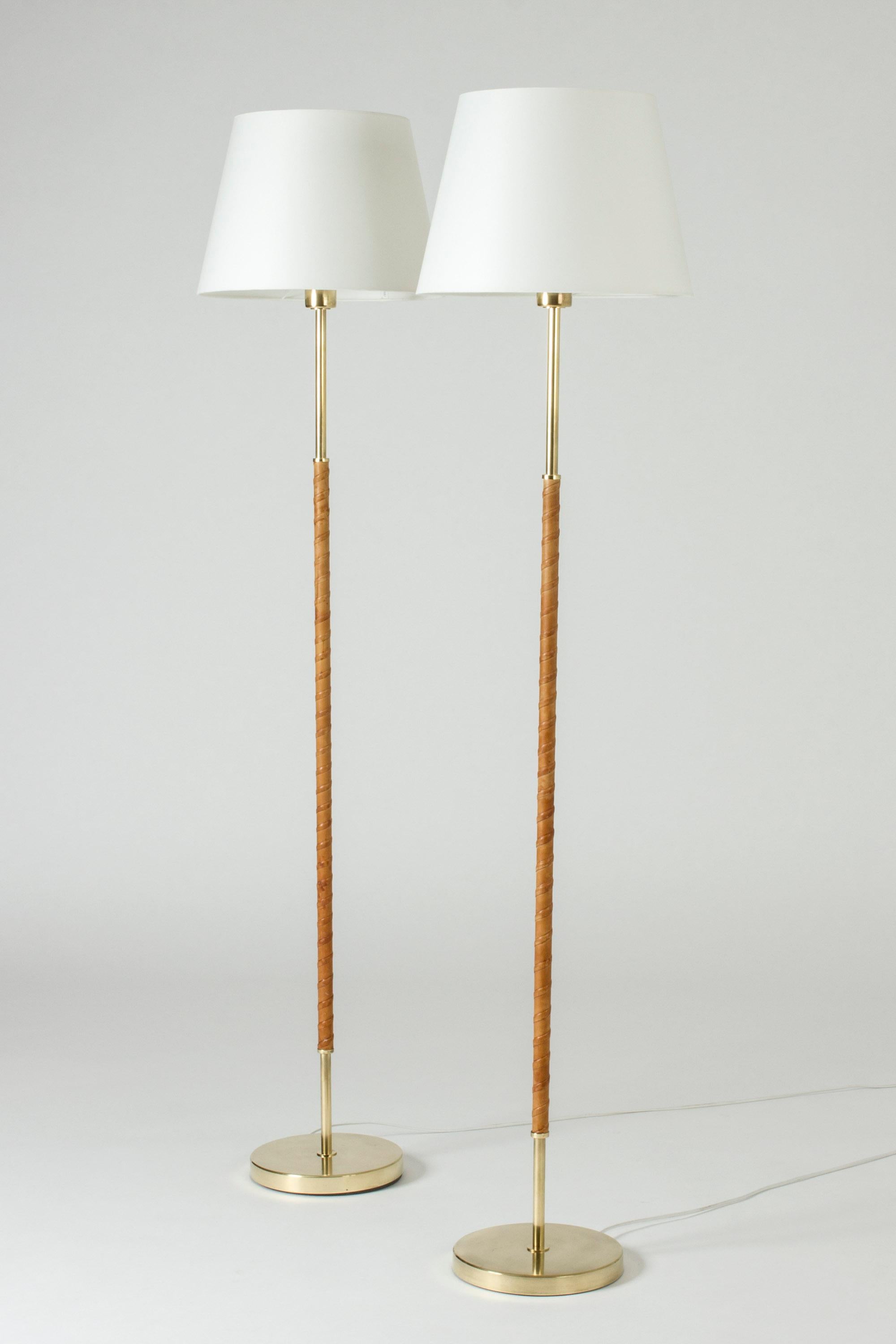 Scandinavian Modern Pair of Brass and Leather Floor Lamps from Böhlmarks, Sweden, 1950s