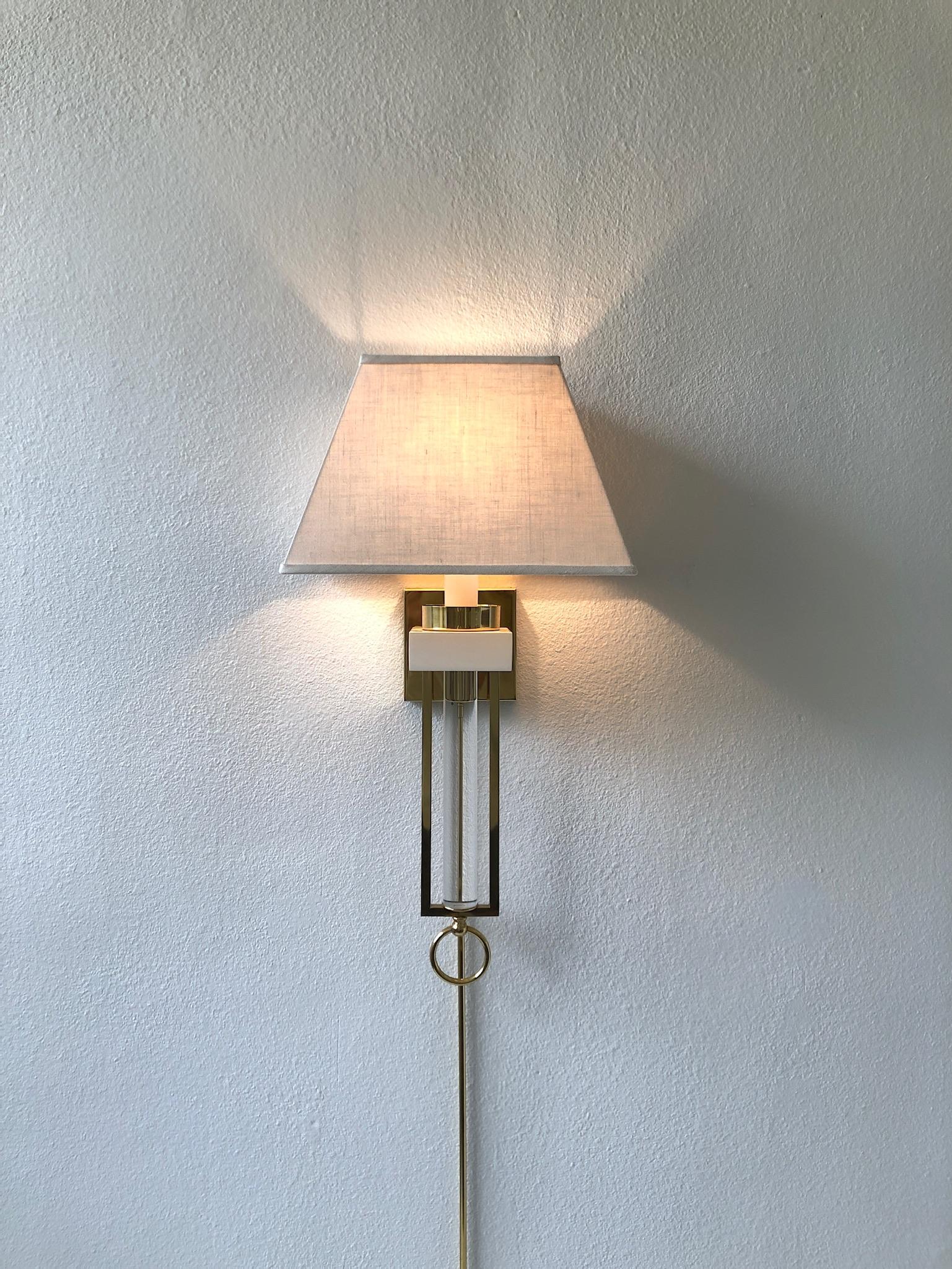 American Pair of Brass and Lucite Wall Sconces For Sale