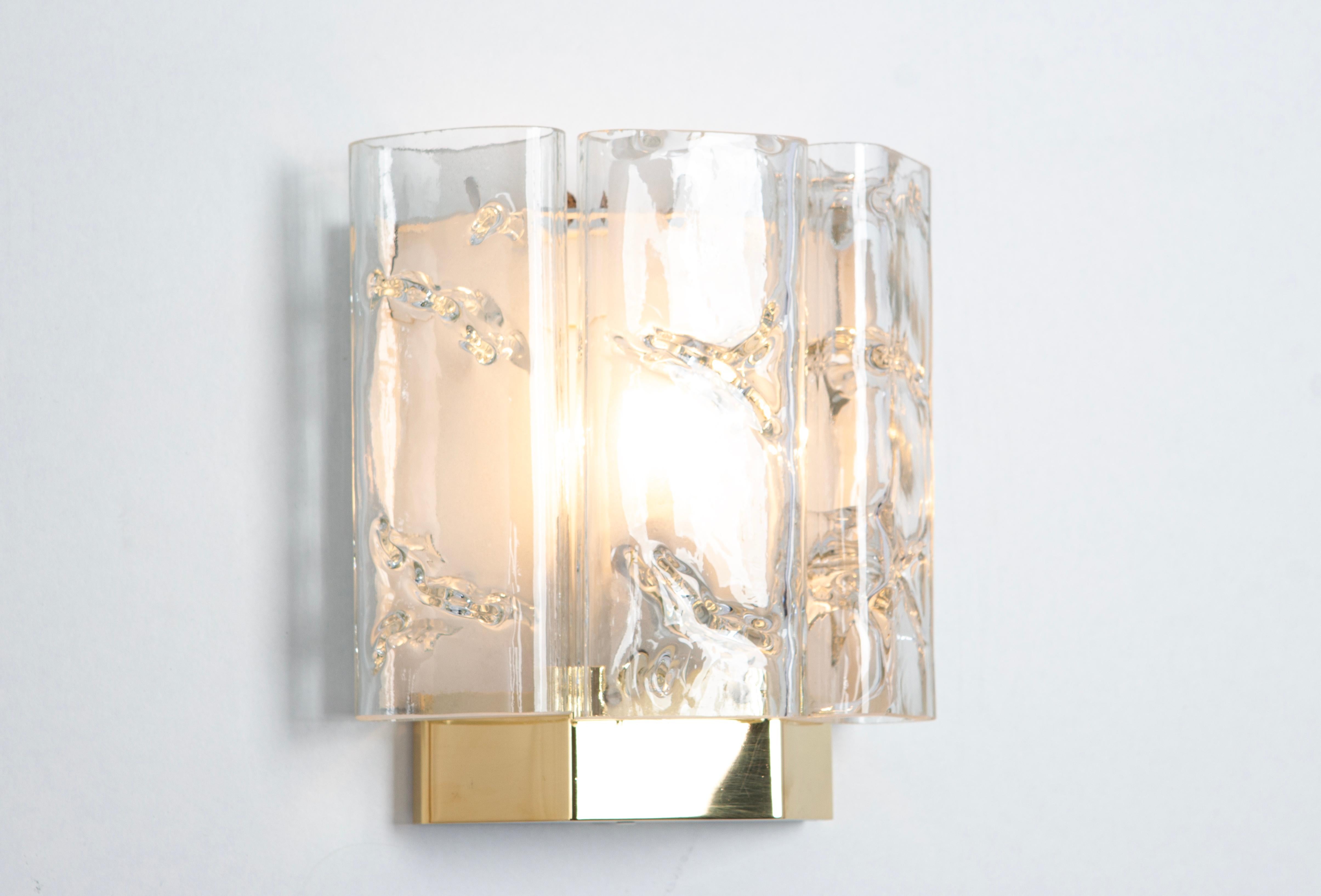 1 of 4 Wonderful midcentury wall sconces with ice glasses, made by Doria Leuchten, Germany, manufactured, circa 1960-1969.

High quality and in very good condition. Cleaned, well-wired and ready to use. 

Each sconce requires 1 x E14 Small bulbs