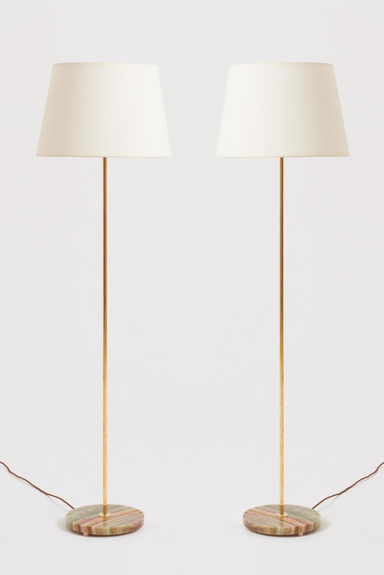 A pair of brass and solid onyx base floor lamps.
Sweden, 1960-1970s
With the shade: 138.5 cm high by 40.5 cm diameter
Lamp base only: 120.5 cm high by 23.5 cm diameter