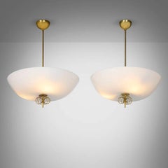 Pair of Brass and Opal Glass Hanging Lights by Paavo Tynell model 1088