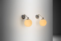 Pair of Brass and Opal Glass Wall Lamps by Paavo Tynell for Taito, Finland 1930s