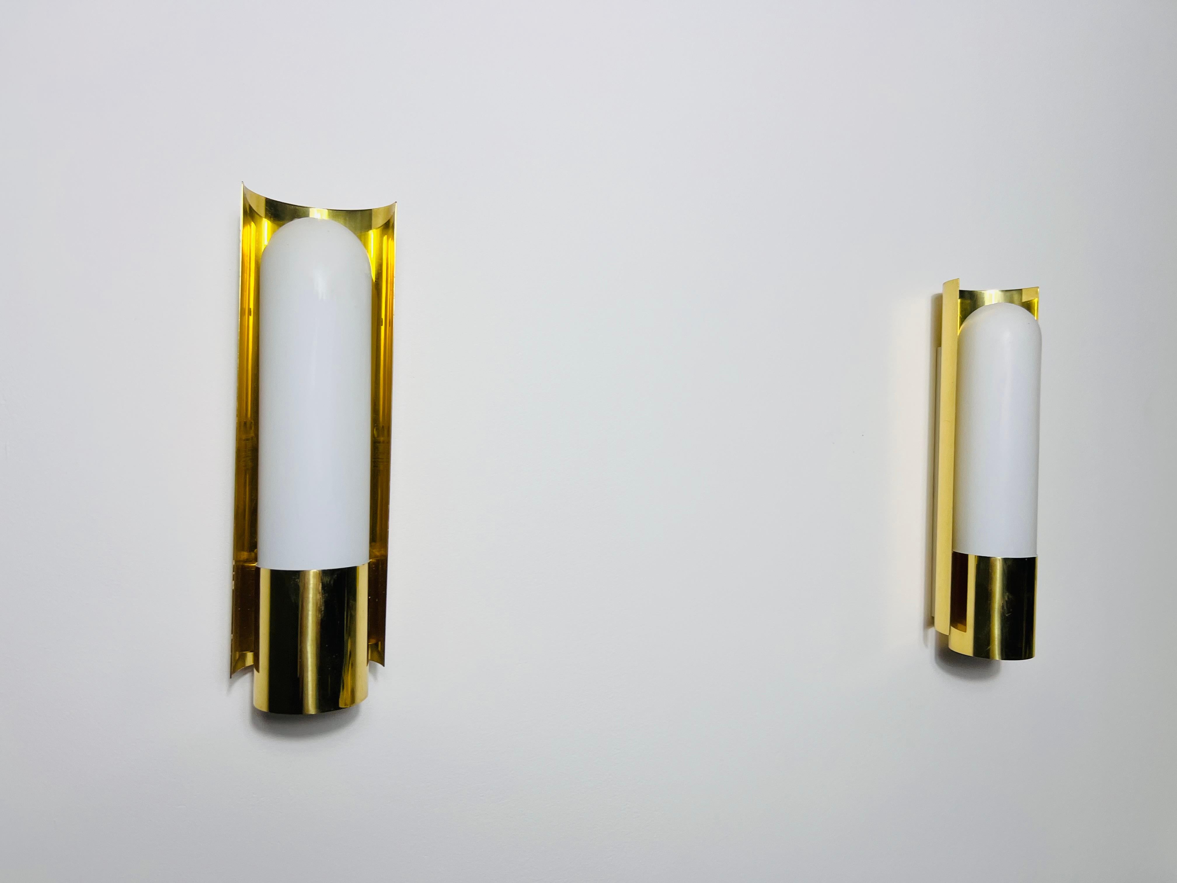 Mid-Century Modern Pair of Brass and Opaline Glass Wall Lamps by Glashütte Limburg, 1960s For Sale