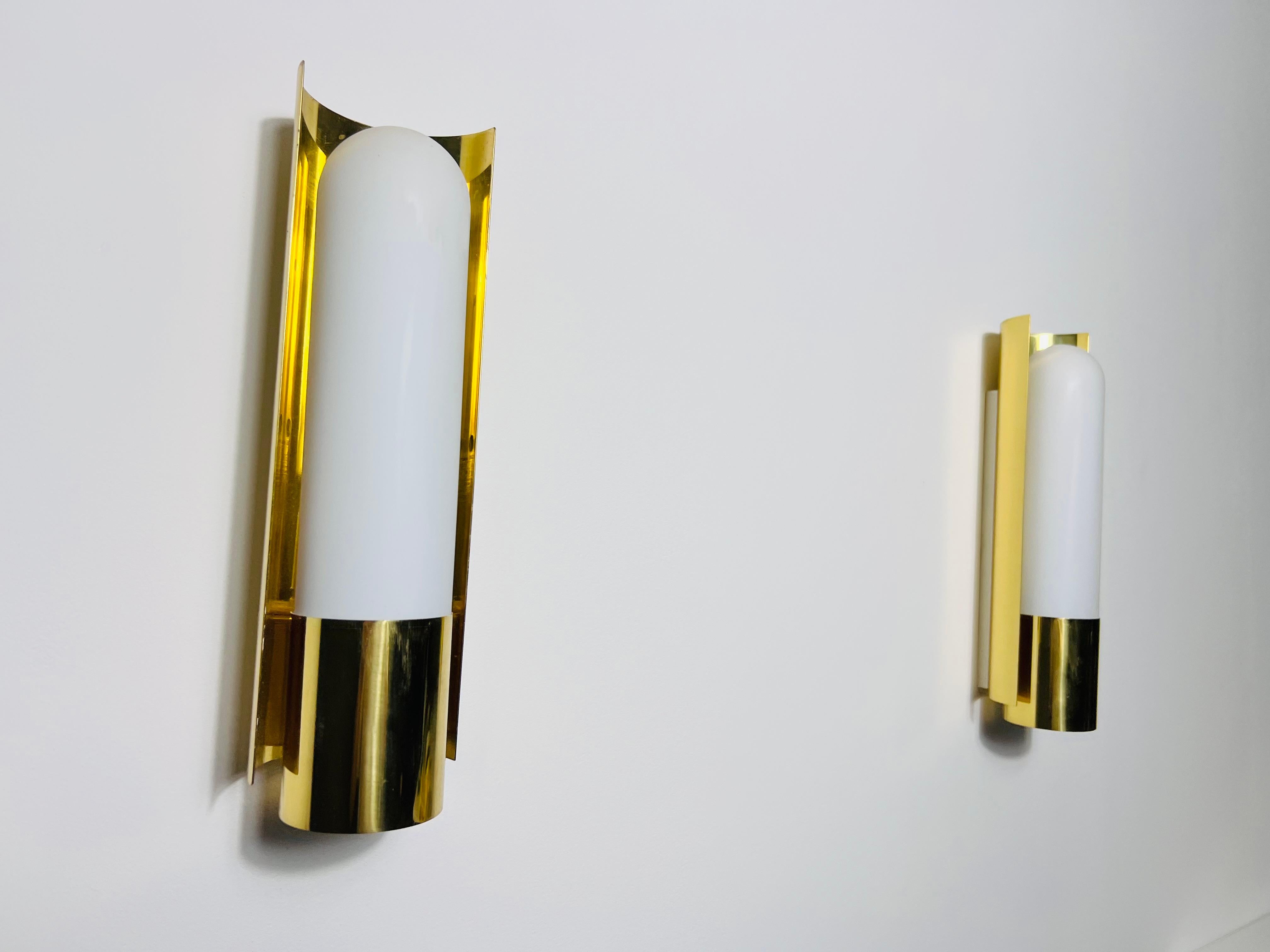 Mid-20th Century Pair of Brass and Opaline Glass Wall Lamps by Glashütte Limburg, 1960s For Sale