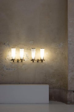 Pair of brass and opaline glass wall lamps by Stilnovo, Italy 1955