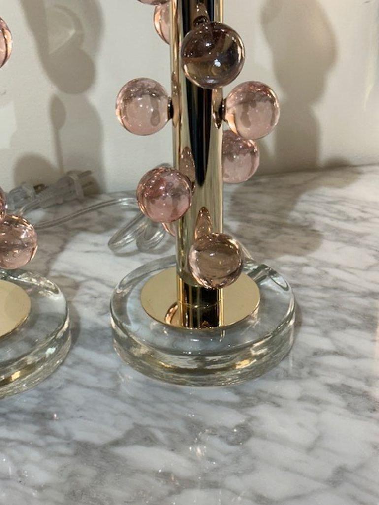 Contemporary Pair of Brass and Pink Glass Ball Form Lamps For Sale