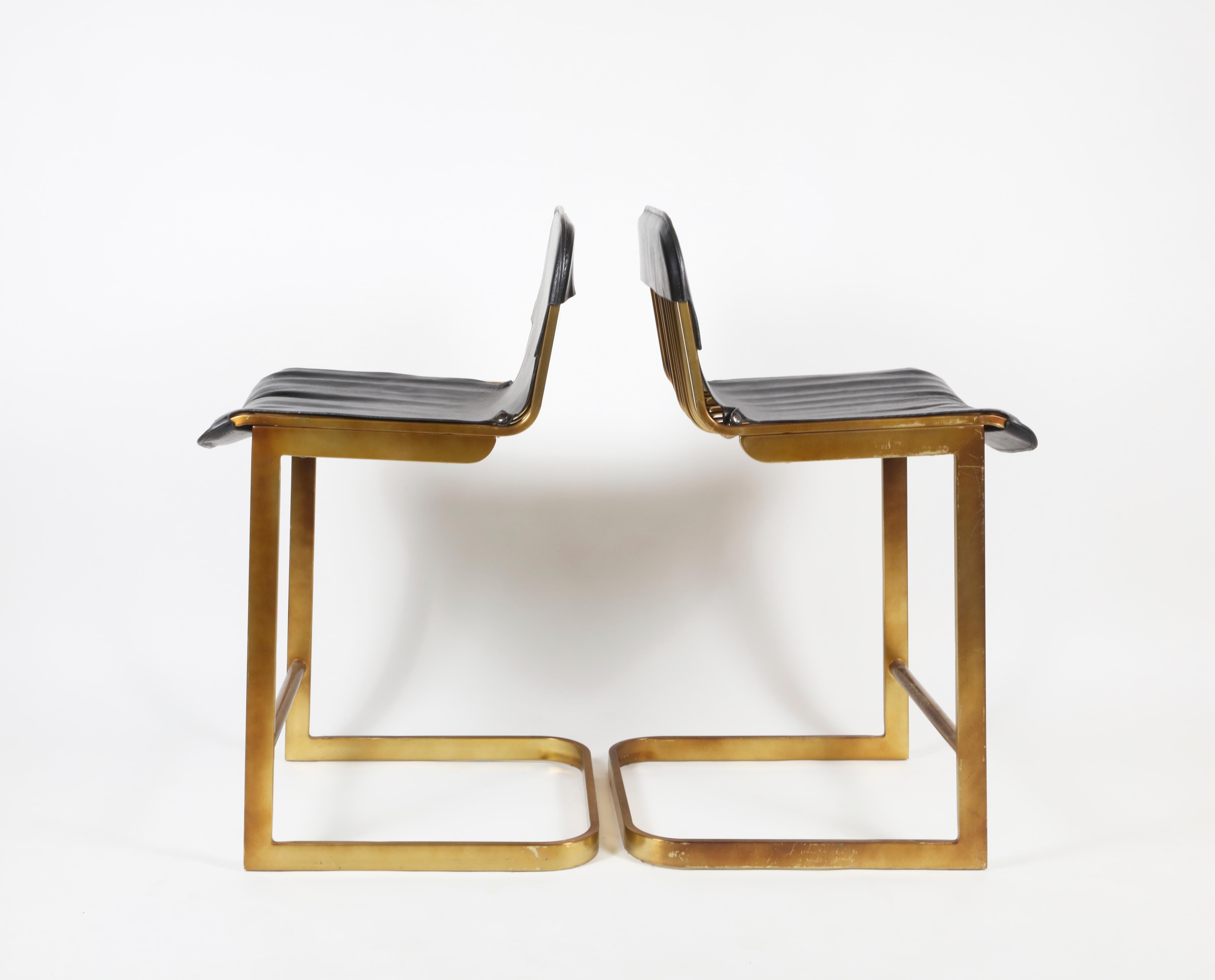 Pair of brass and pleather bar stools

Measures: 17