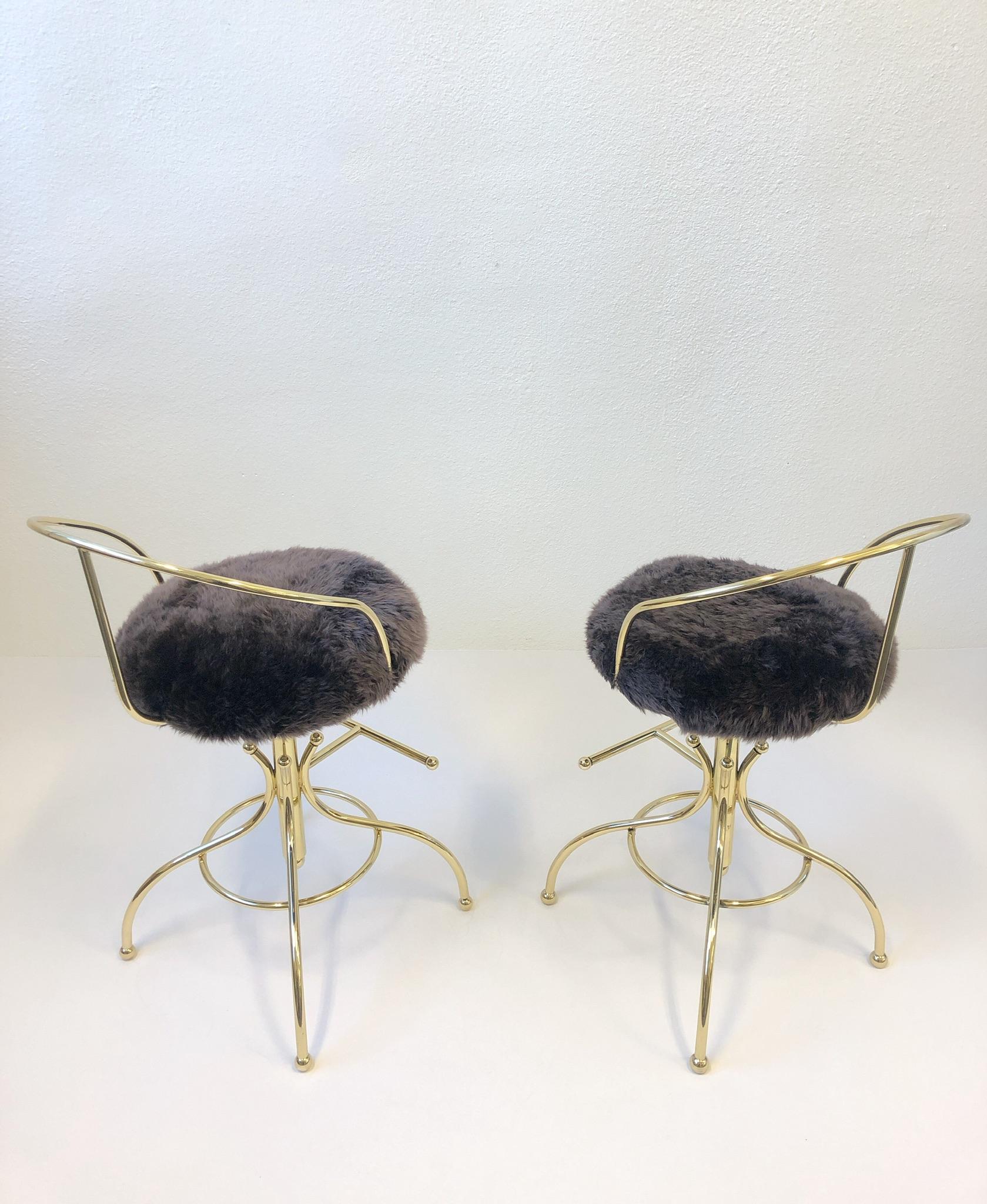 Mid-20th Century Pair of Brass and Sheepskin Swivel Barstools by Charles Hollis Jones For Sale