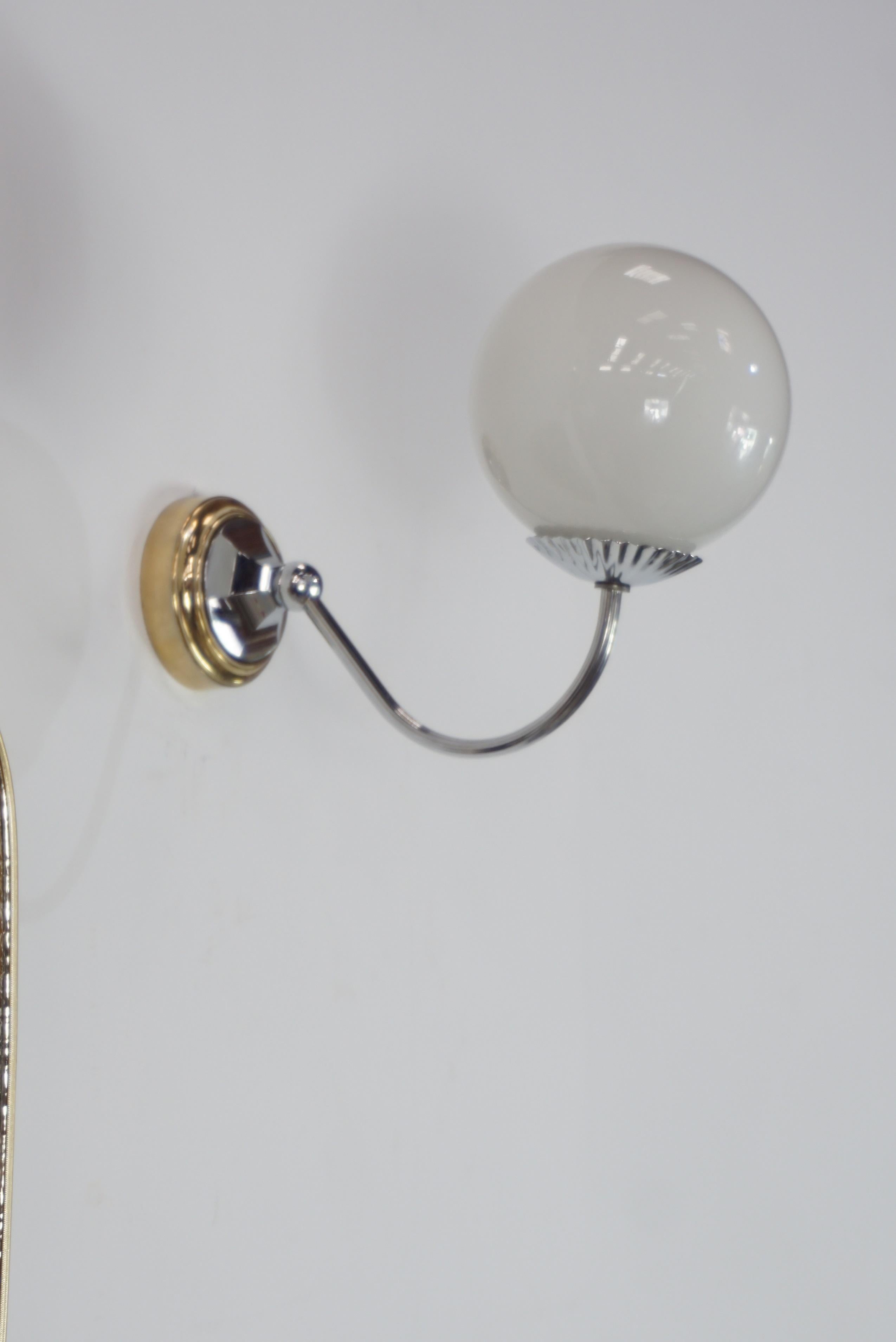 Hollywood Regency Pair Of Brass and White Opaline Ball Shaped Wall Sconces