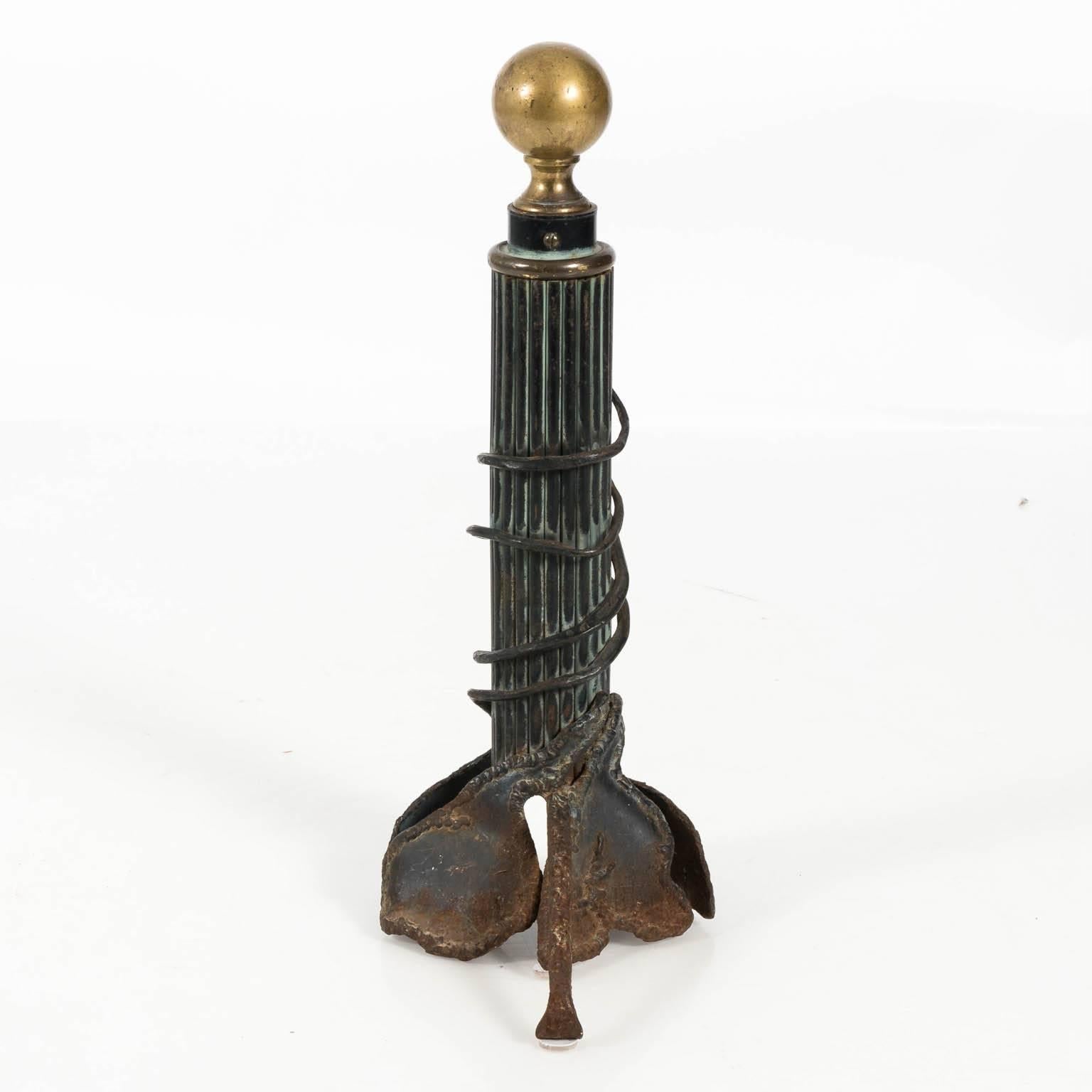 Pair of artist made andirons with brass ball finials and a fluted iron column body, circa 20th century.
    