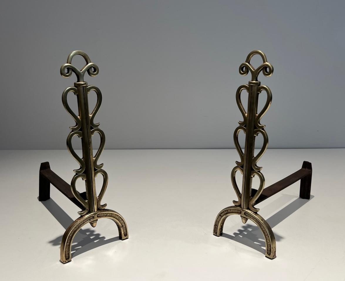Mid-Century Modern Pair of Brass Andirons in the Style of Raymond Subes For Sale