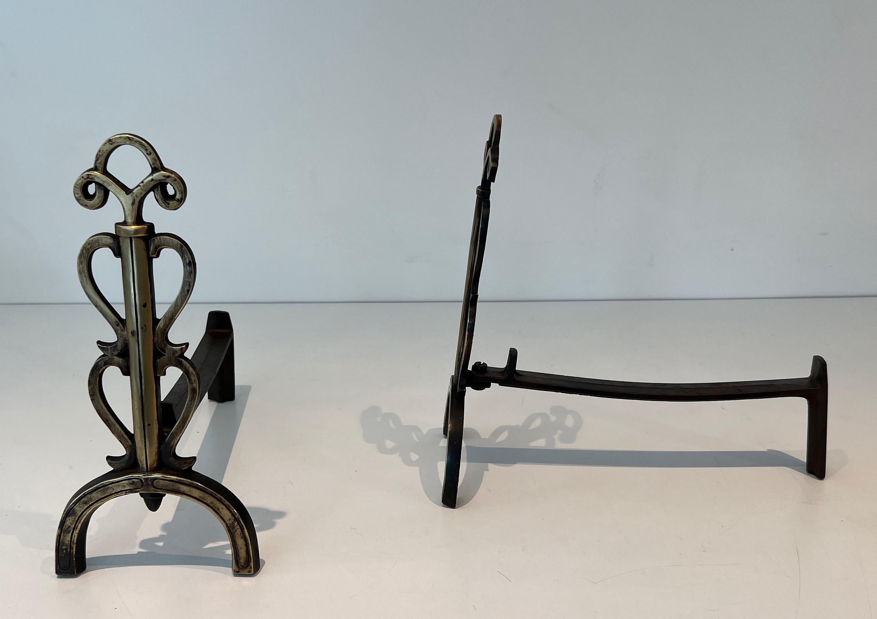 Mid-Century Modern Pair of Brass Andirons in the Style of Raymond Subes For Sale