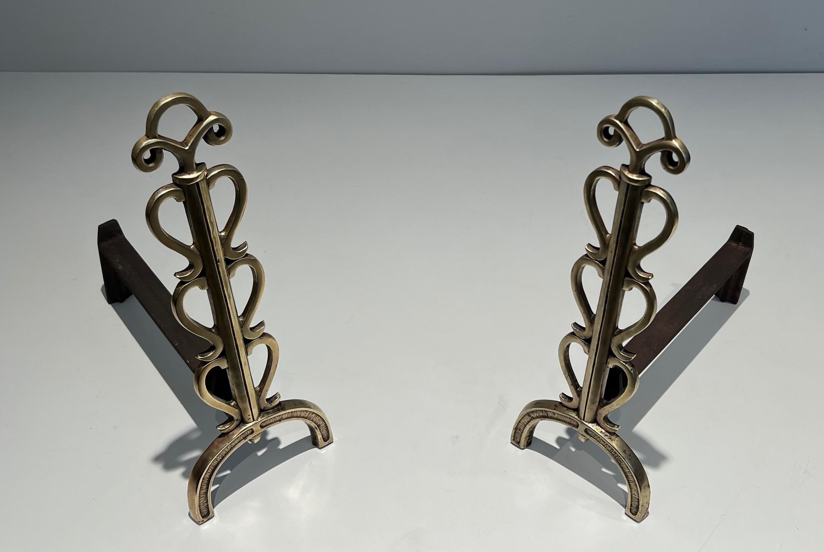 French Pair of Brass Andirons in the Style of Raymond Subes For Sale