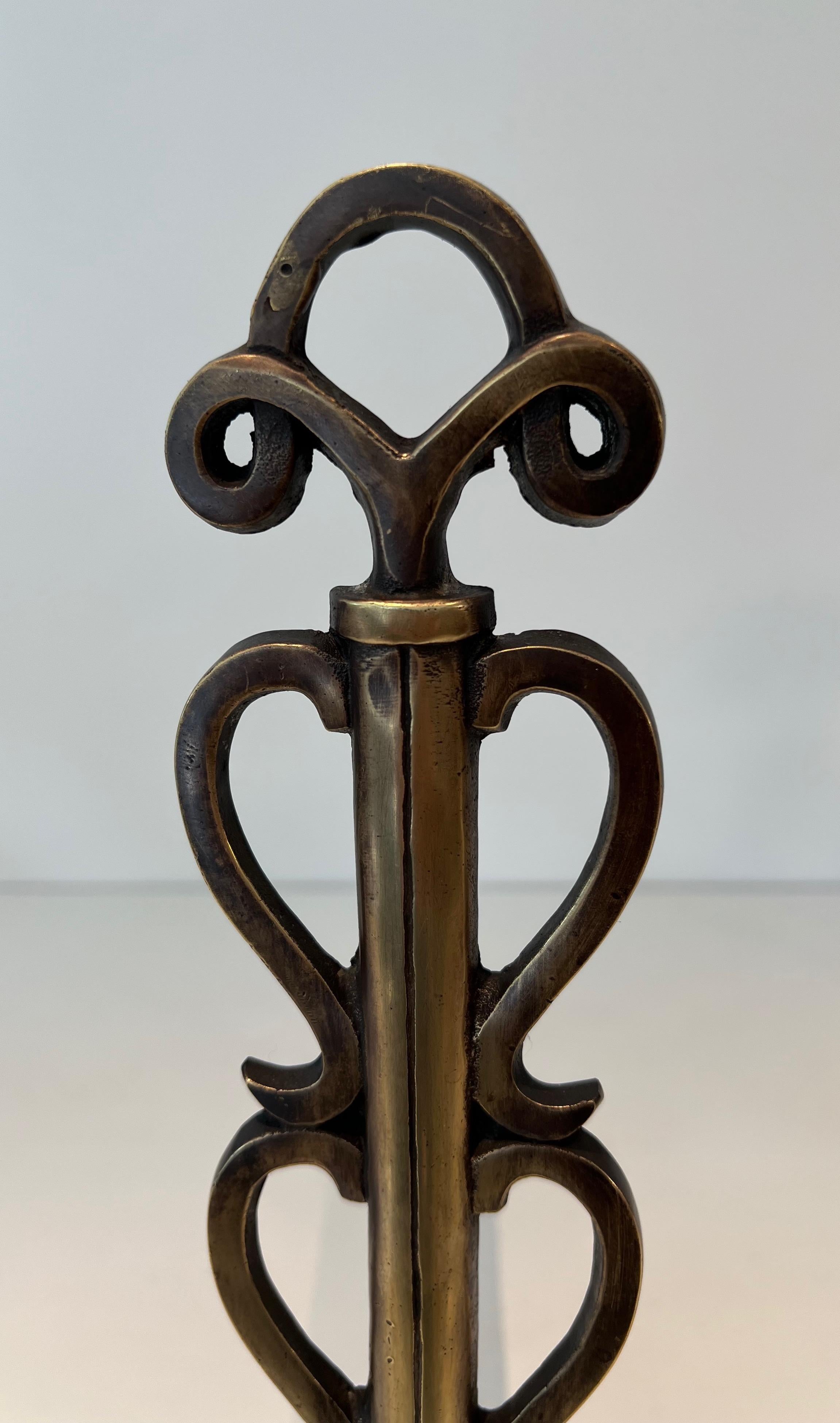 Mid-20th Century Pair of Brass Andirons in the Style of Raymond Subes For Sale