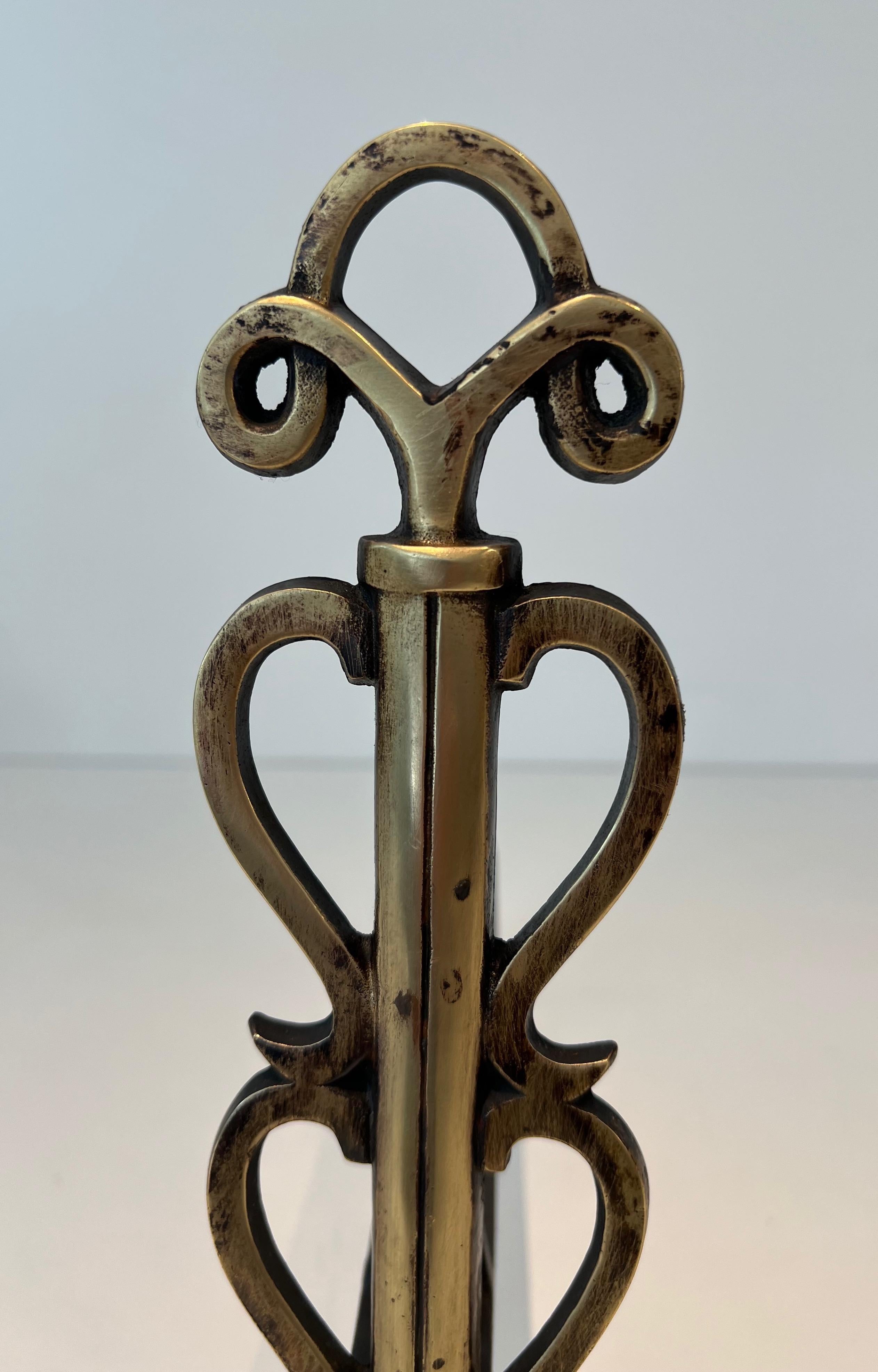 Mid-20th Century Pair of Brass Andirons in the Style of Raymond Subes For Sale