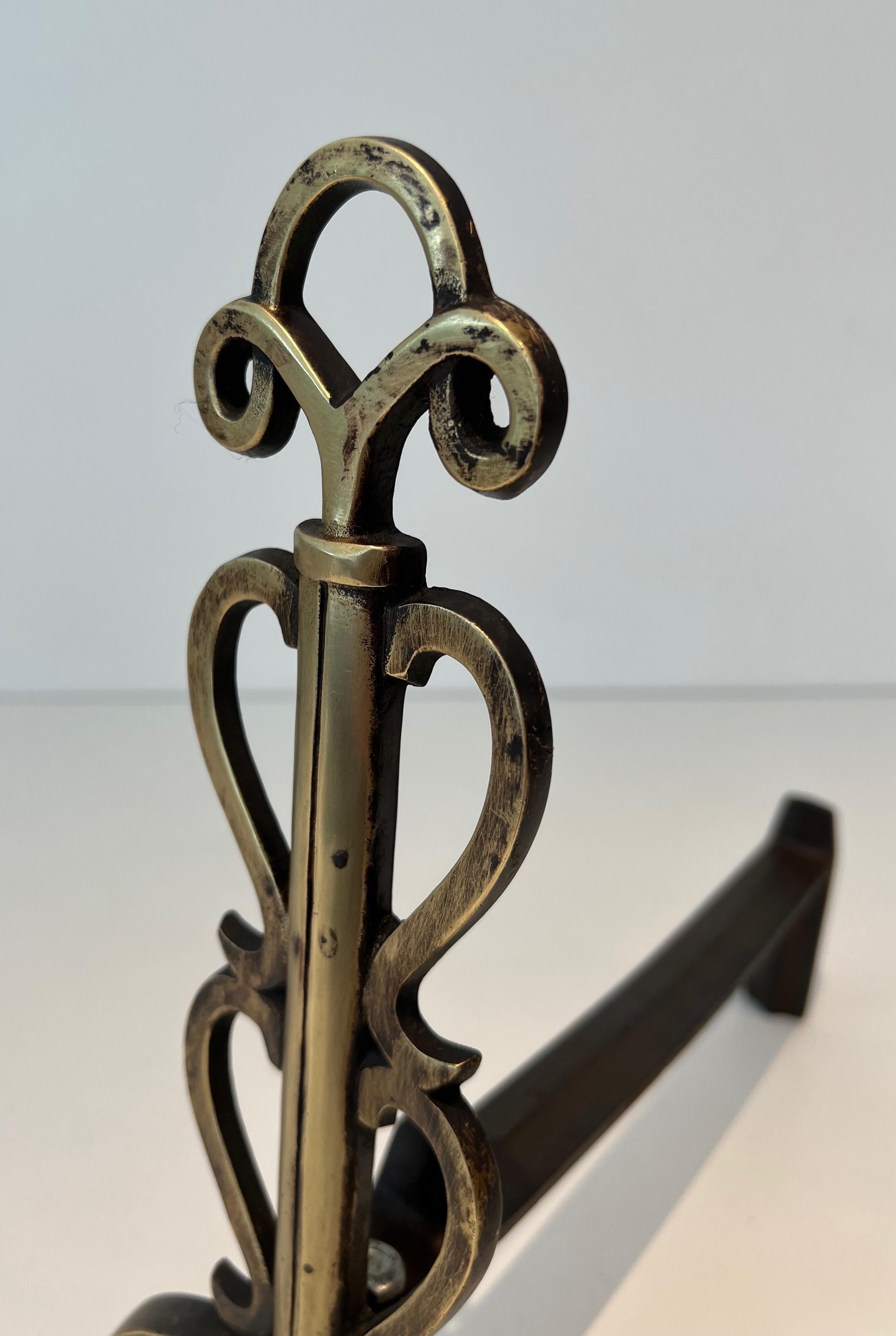 Pair of Brass Andirons in the Style of Raymond Subes For Sale 1