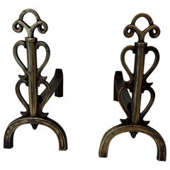 Pair of Brass Andirons in the Style of Raymond Subes