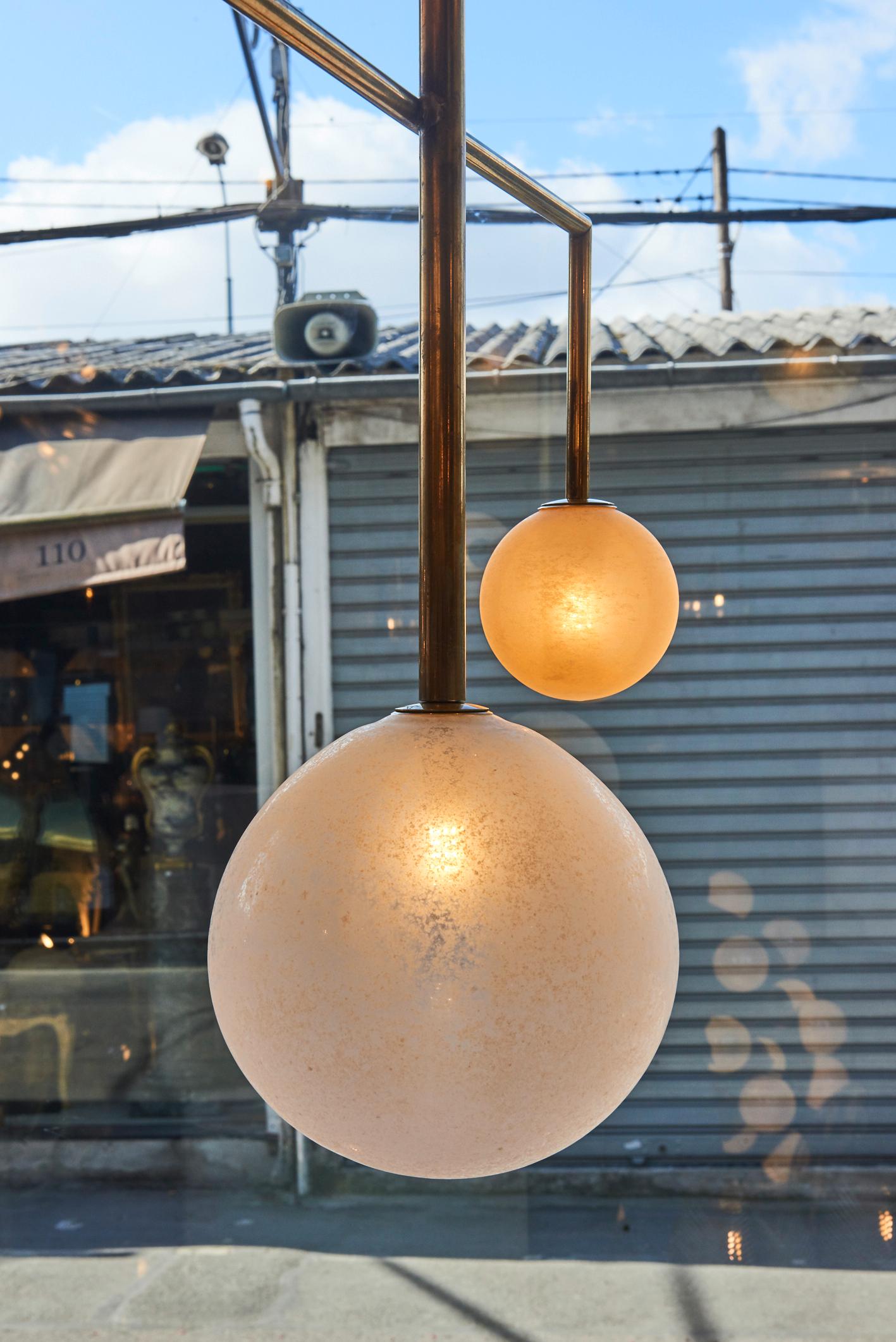Pair of Brass Angular Chandeliers with Glass Globes In Good Condition In Saint-Ouen, IDF