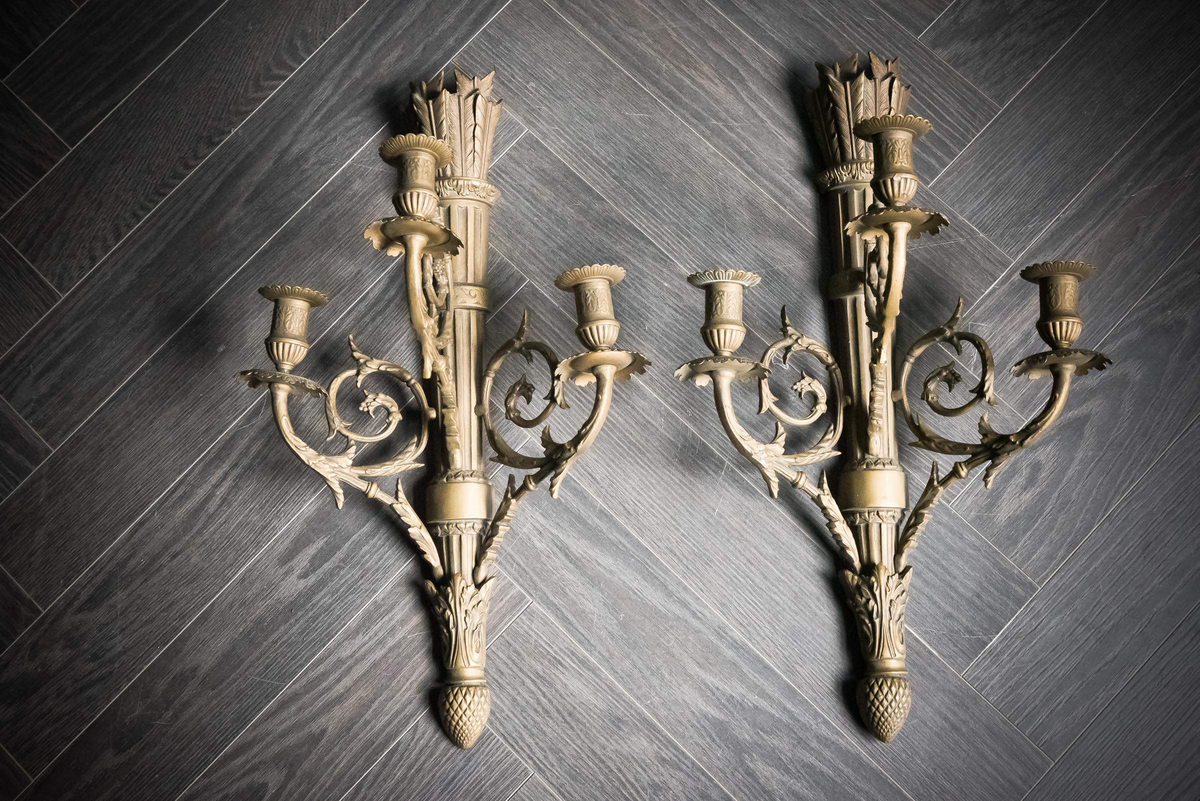 Pair of brass arrow Quiver wall candle sconces.