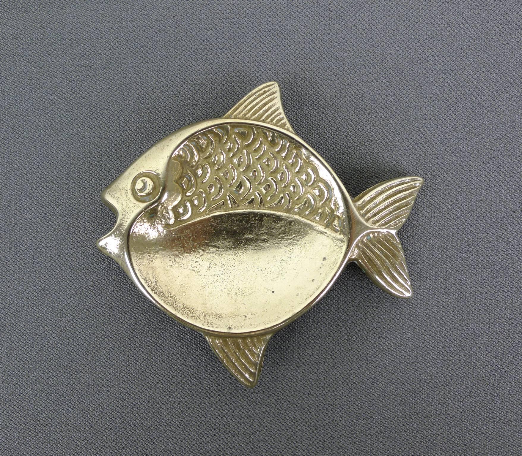 Set of two small brass ashtrays in the shape of a fish. They were made in the 1950s in Germany.
Both are in very good condition.