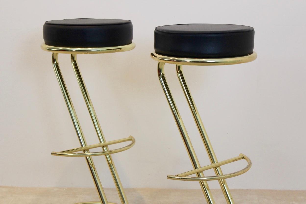 black and brass bar stools