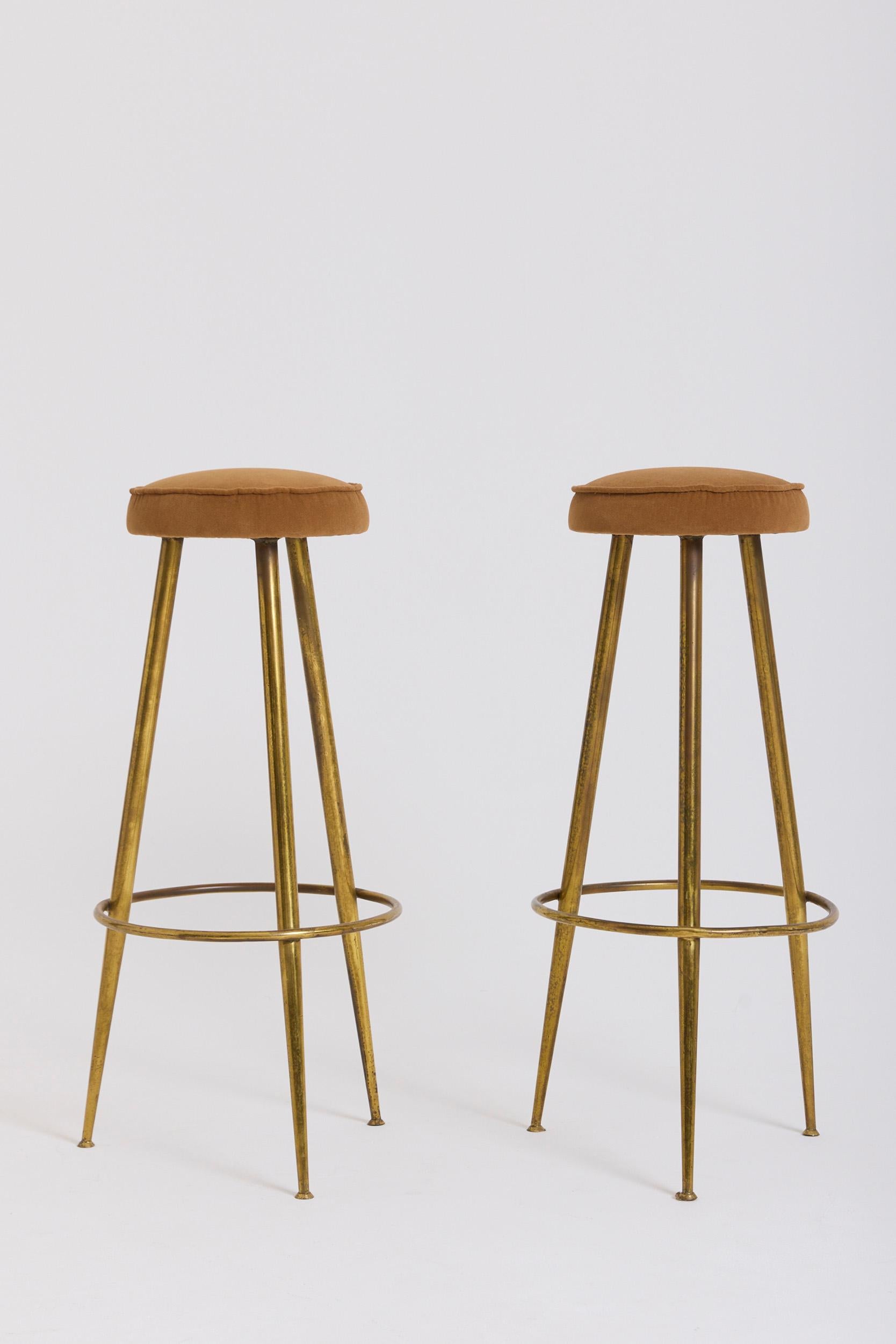 A pair of brass bar stools
Italy, Circa 1950
79 cm high by 40 cm diameter, seat diameter: 26.5 cm