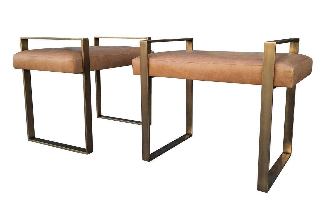 Pair of aged brass benches designed and manufactured by Charles Hollis Jones in the 1970s.

Dimensions:
25