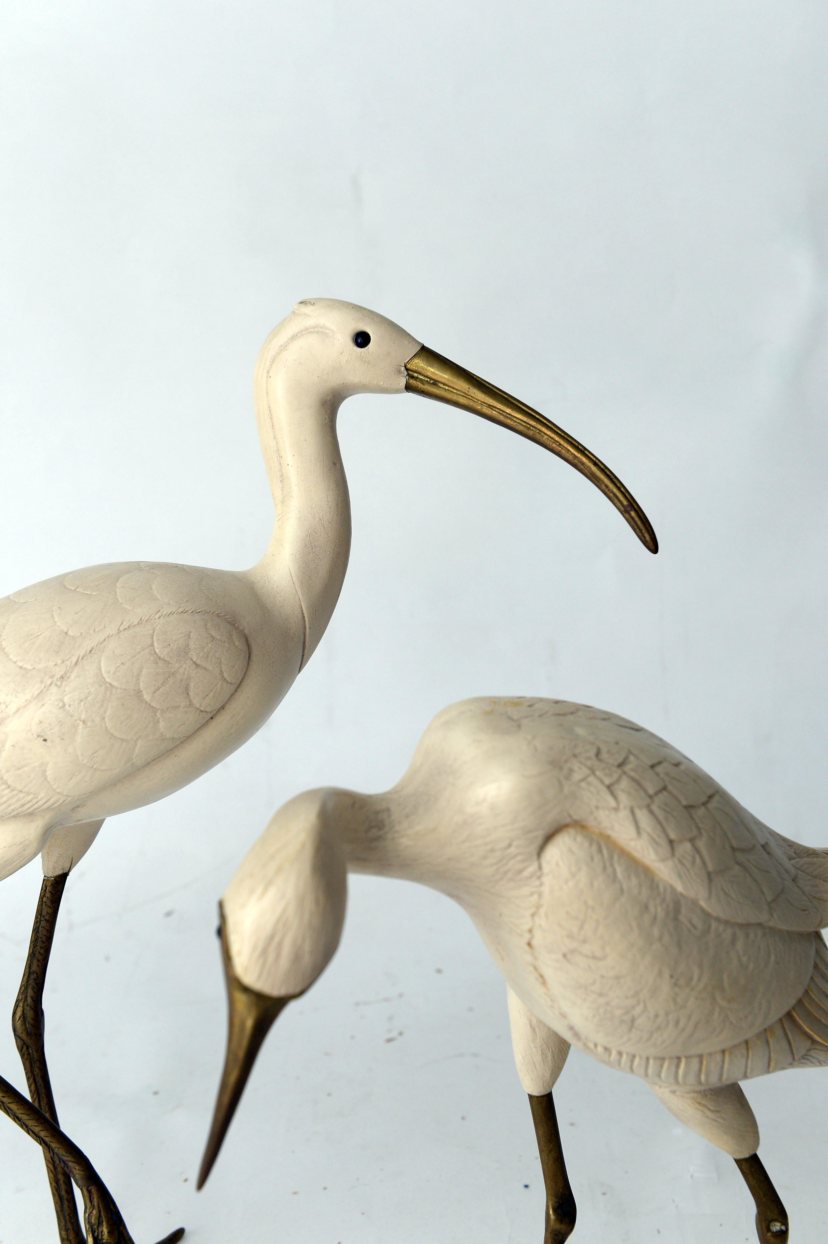 Pair of sculptural crane birds by Elli Malevolti made from brass and a resing body.

These collectible pieces are signed by the artist.

Good condition.

1950s - Italy

Dimensions largest bird:
Height: 39cm/15.35
Width: 12cm4.72