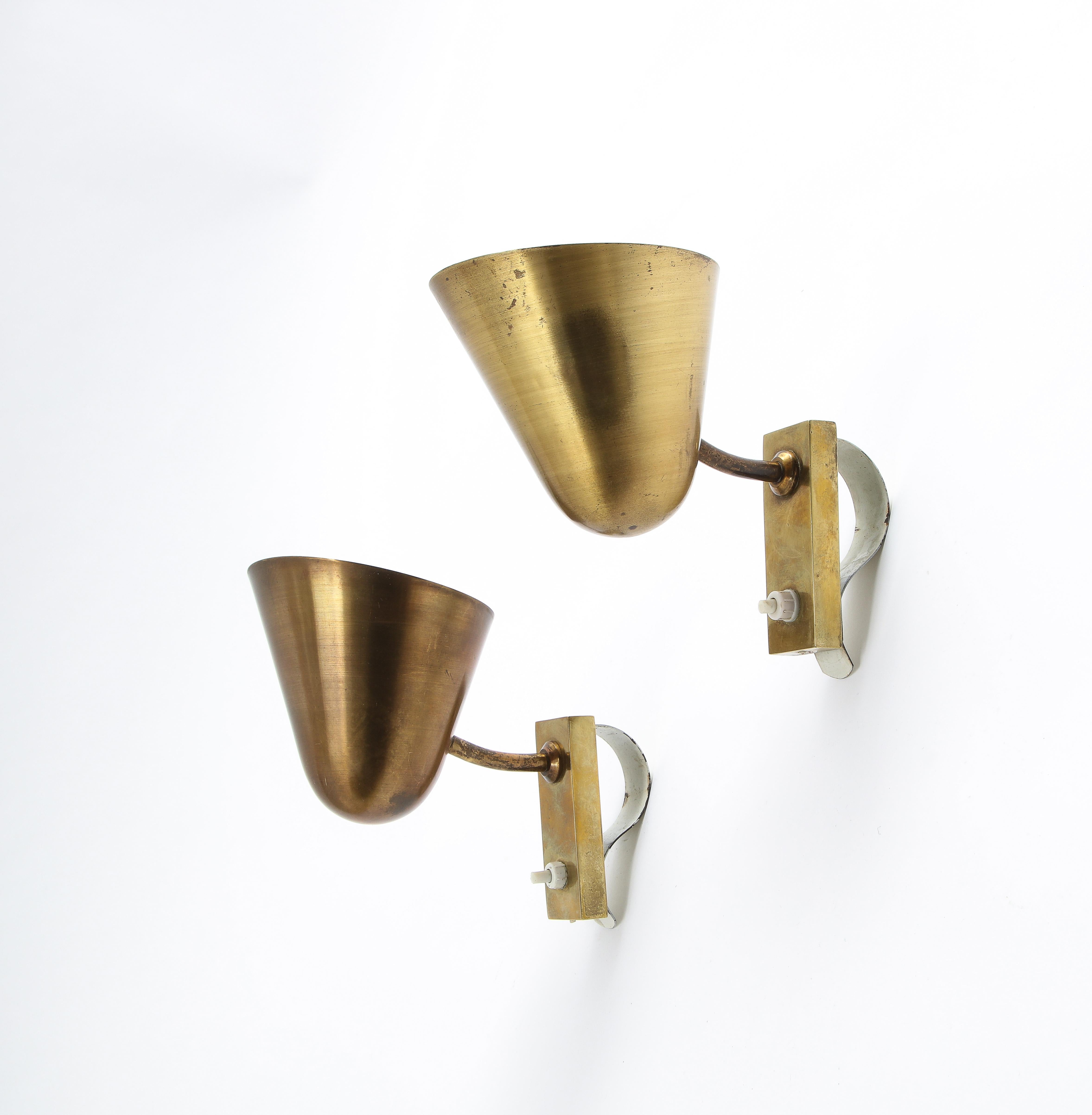 Classic brass sconces with adjustable 