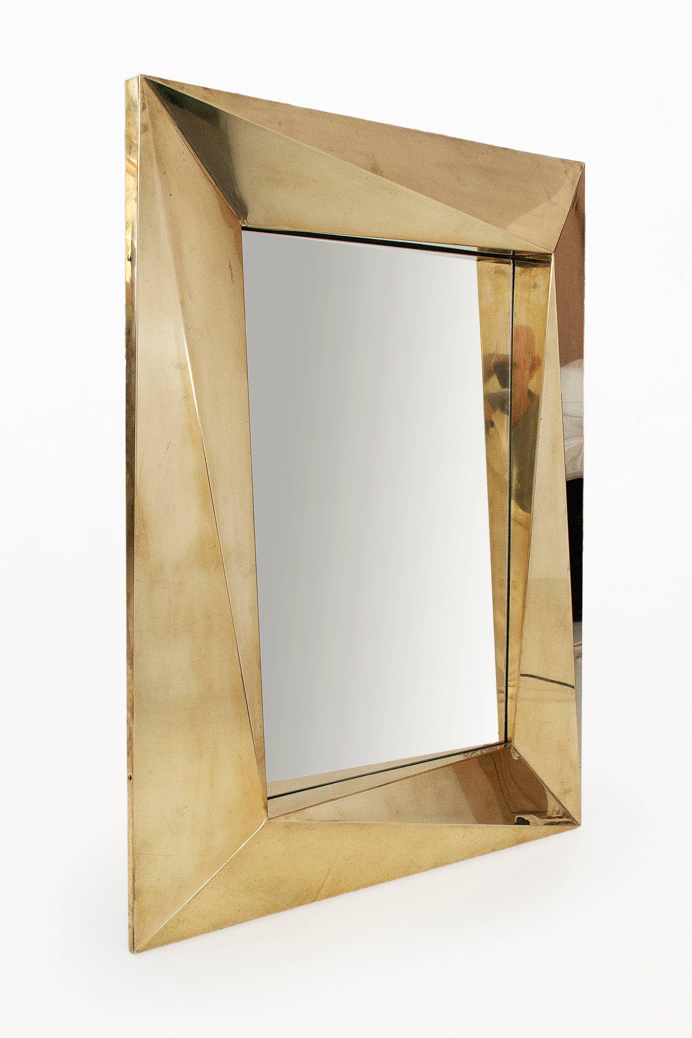 Pair of brass Brutalist wall mirrors.
Frame with geometrical form,
circa 2000, Italy.
Very good condition.