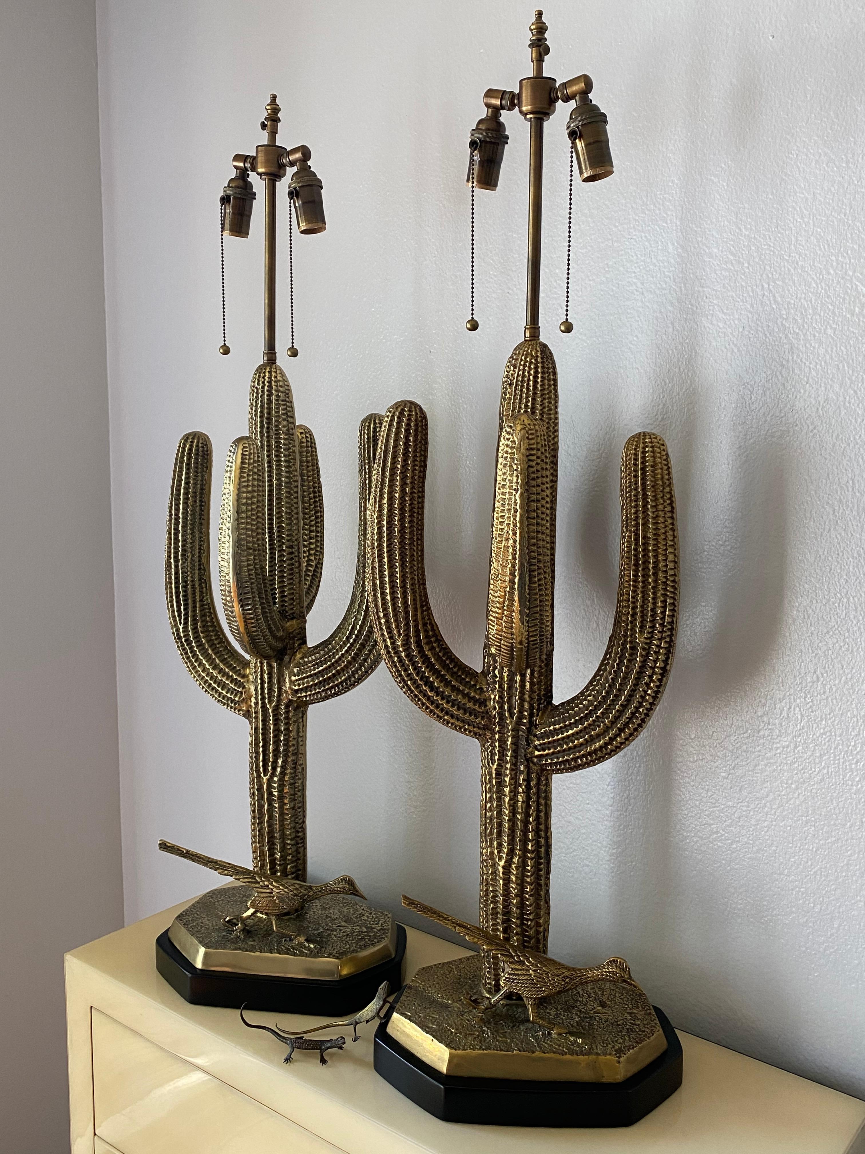 Pair of massive brass saguaro cactus lamps. Lizards are for decoration and are not for sale.