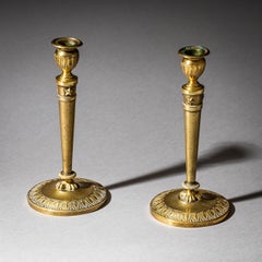 Paire de bougeoirs en laiton, France, XIXe siècle