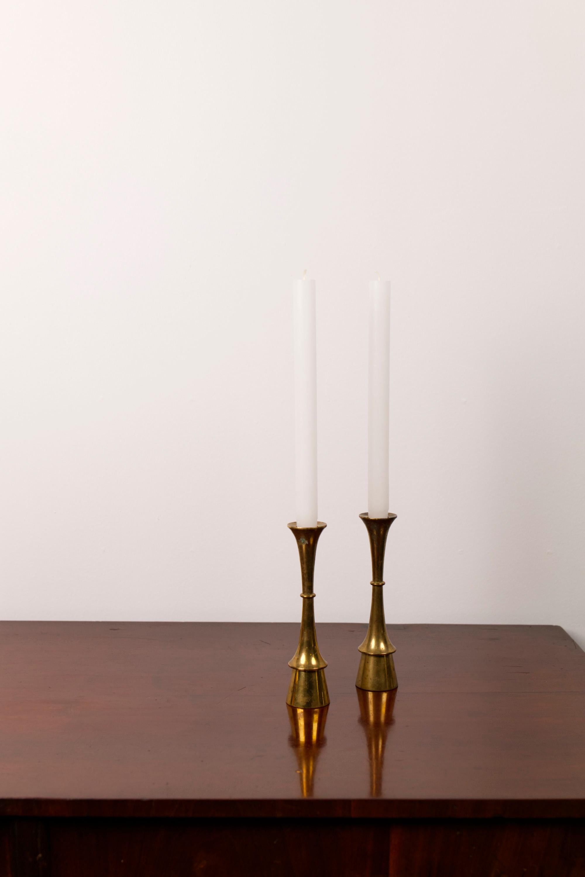 Pair of Brass Candlesticks, Attributed to Jens H. Quistgaard – Denmark, 1960s

This elegant pair of brass candlesticks, attributed to renowned Danish designer Jens H. Quistgaard, reflects the refined simplicity and sculptural balance characteristic