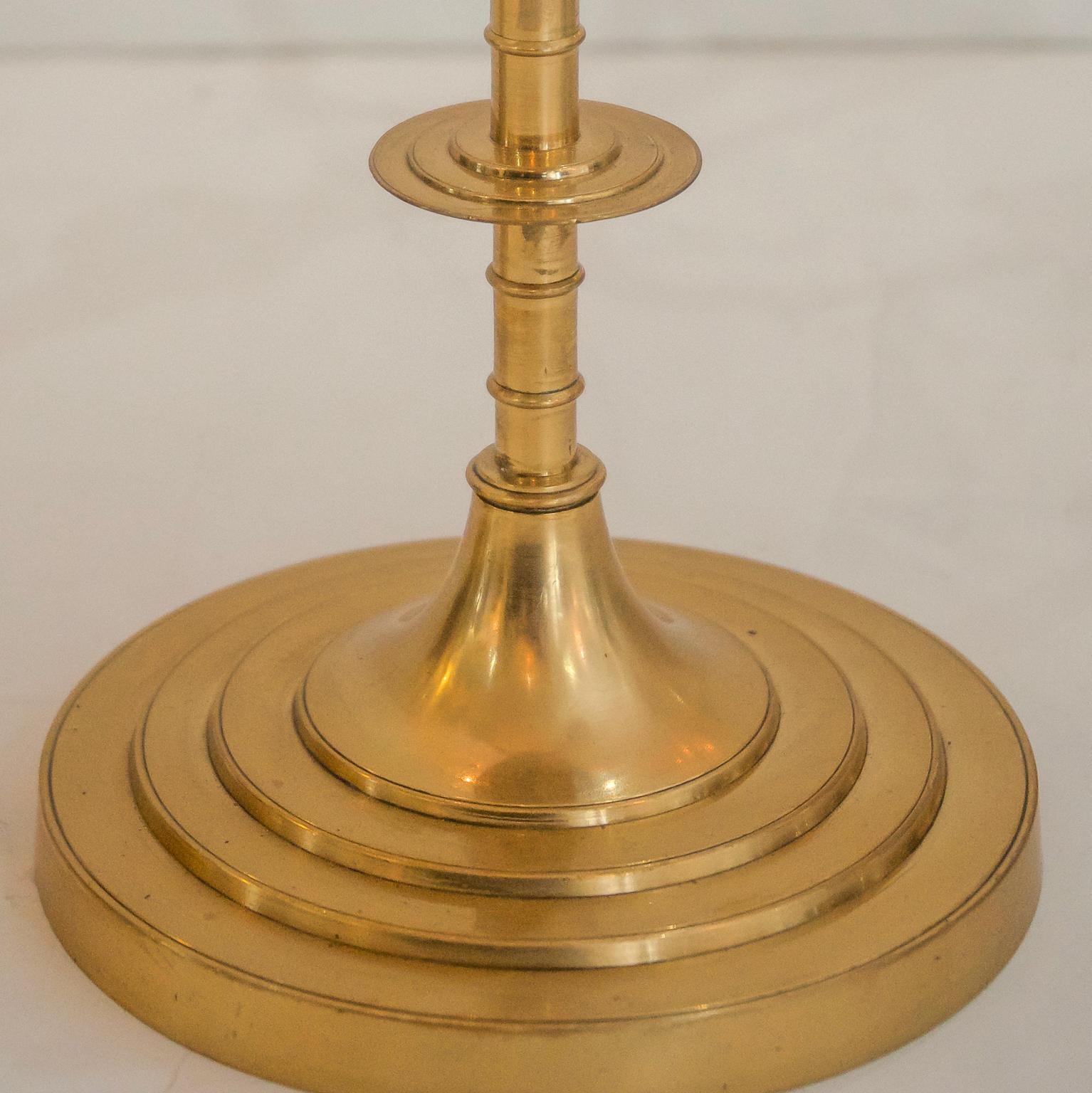 This stylish set of brass candelabrum date to the late 19th century and were acquired in London, England.