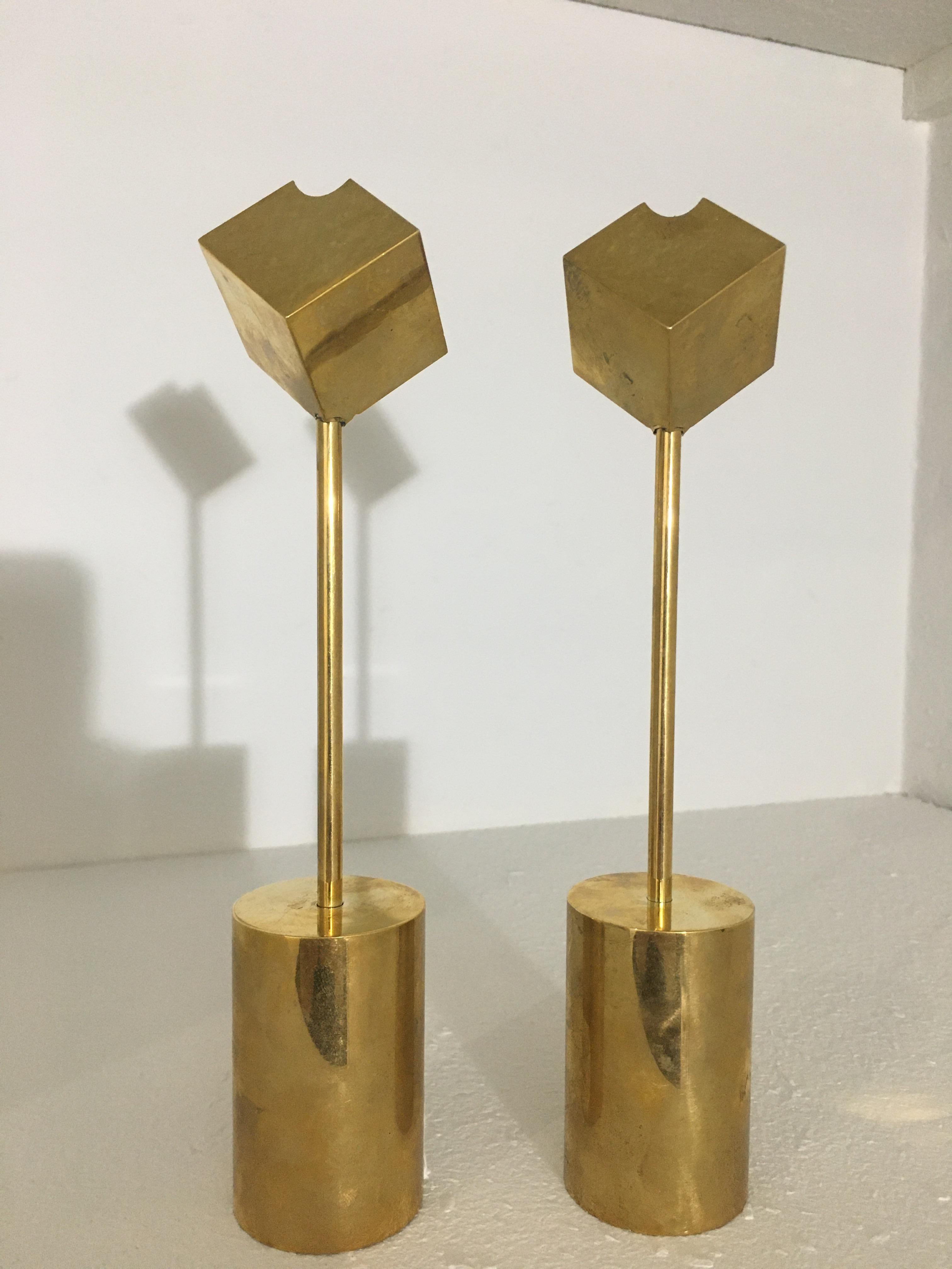 This pair of candlesticks by Swedish designer Pierre Forssell (1925-2004) are made of heavy gilt-brass. These models 1607 manufactured by Skultana, Sweden in 1964 and are both stamped with makers mark's 