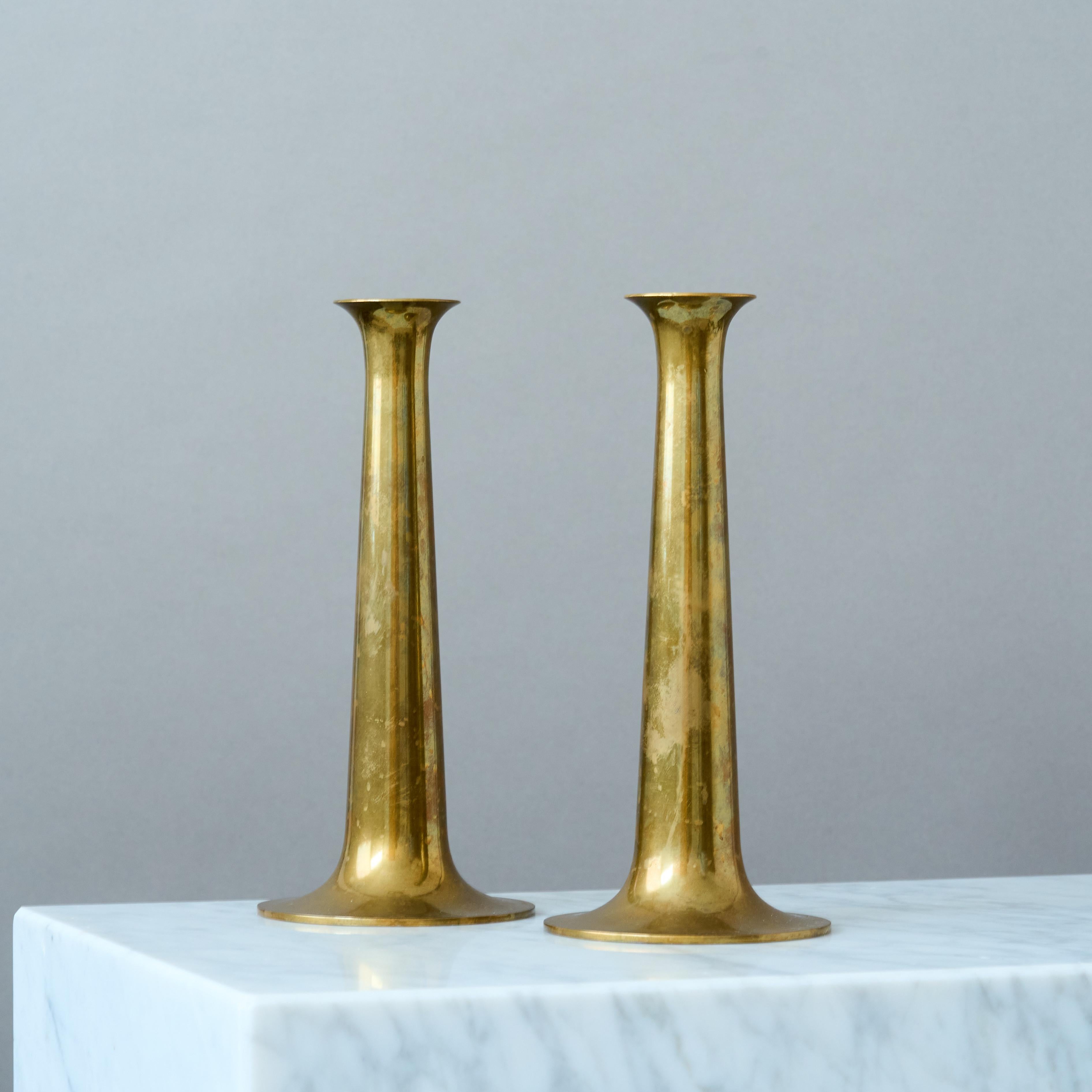 Scandinavian Modern Pair of Brass Candlesticks by Hans Bolling for Torben Orskov. Denmark, 1960s. For Sale