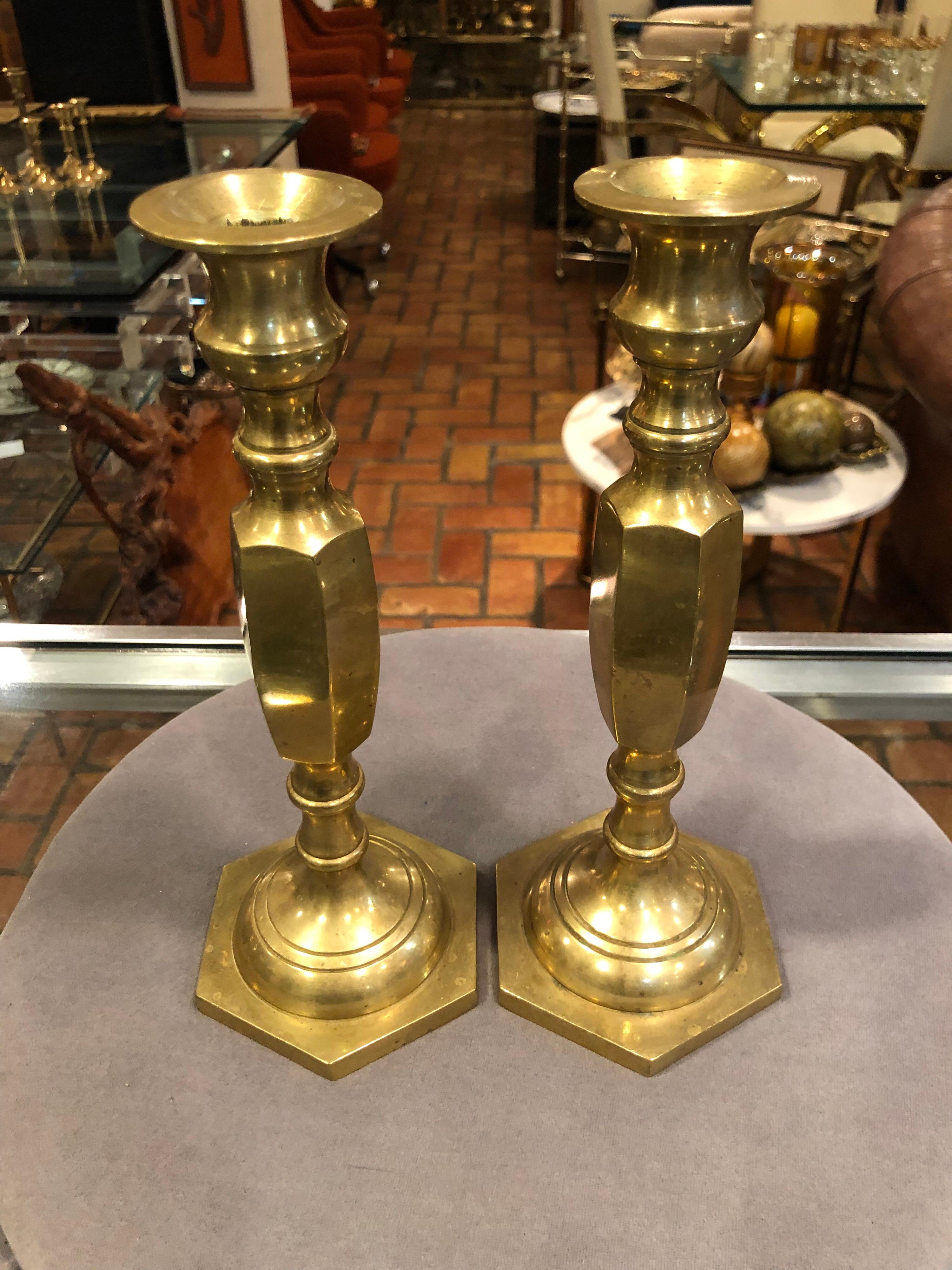 Pair of brass candlesticks. Classic and traditional in style. Nice weight to them.
 