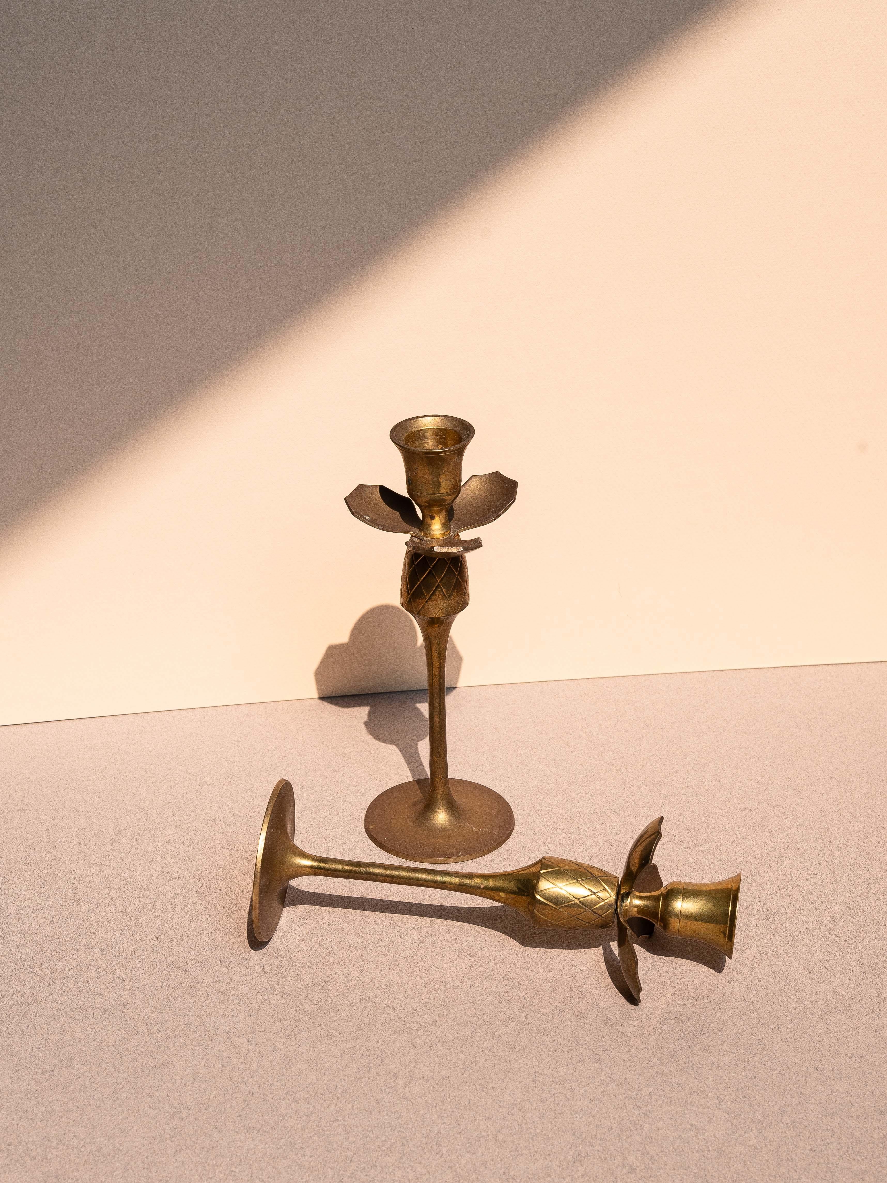Pair of Brass Candlesticks, Pineapple Fruit, France 1920s

Elegant set of two brass candlesticks stylized as a pineapple fruit on top.

Beautiful patina and in perfect condition of use.

Very typical of French tableware and decorative objects from