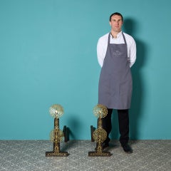 Pair of Brass & Cast Iron Fire Dogs in the Style of Ernest Gimson