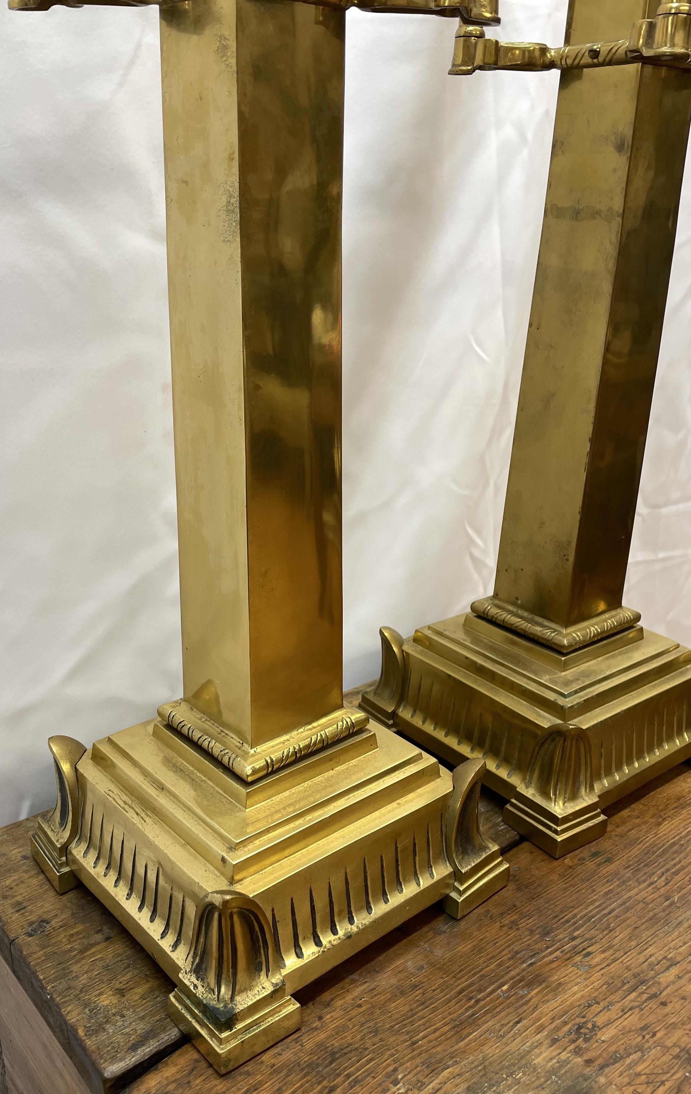 Brass Pair of brass cathedral-style lamps with four candleholders each For Sale