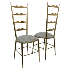 Pair of brass chairs, Italy, 1950s
