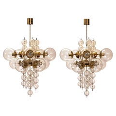 Pair of brass chandeliers by Kamenický Šenov, 1965