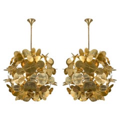 Paire de lustres en laiton par Studio Glustin