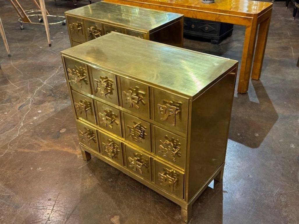 Gorgeous pair of Chinoiserie manner beside tables made of brass after Mastercraft.  So elegant and unique.  Includes 3 drawers for storage. An outstanding pair!
33w x 17d x 30.5h