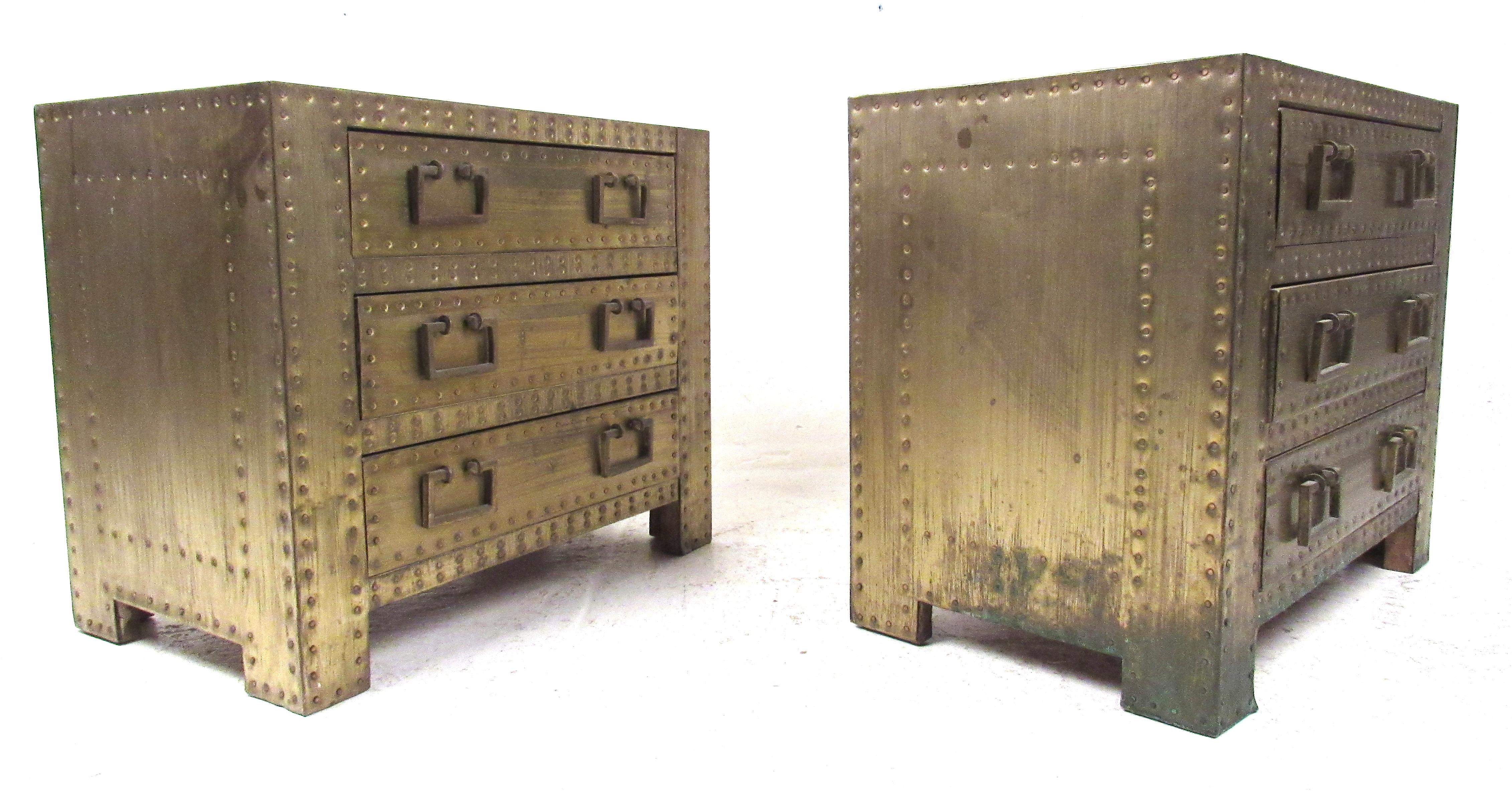 Great pair of brass-clad and copper-nail studded 3-drawer chests by Sarreid, Ltd., circa 1970s. Smaller in scale, these richly patinated cabinets make ideal bedside nightstands. Please confirm item location (NY or NJ) with dealer.