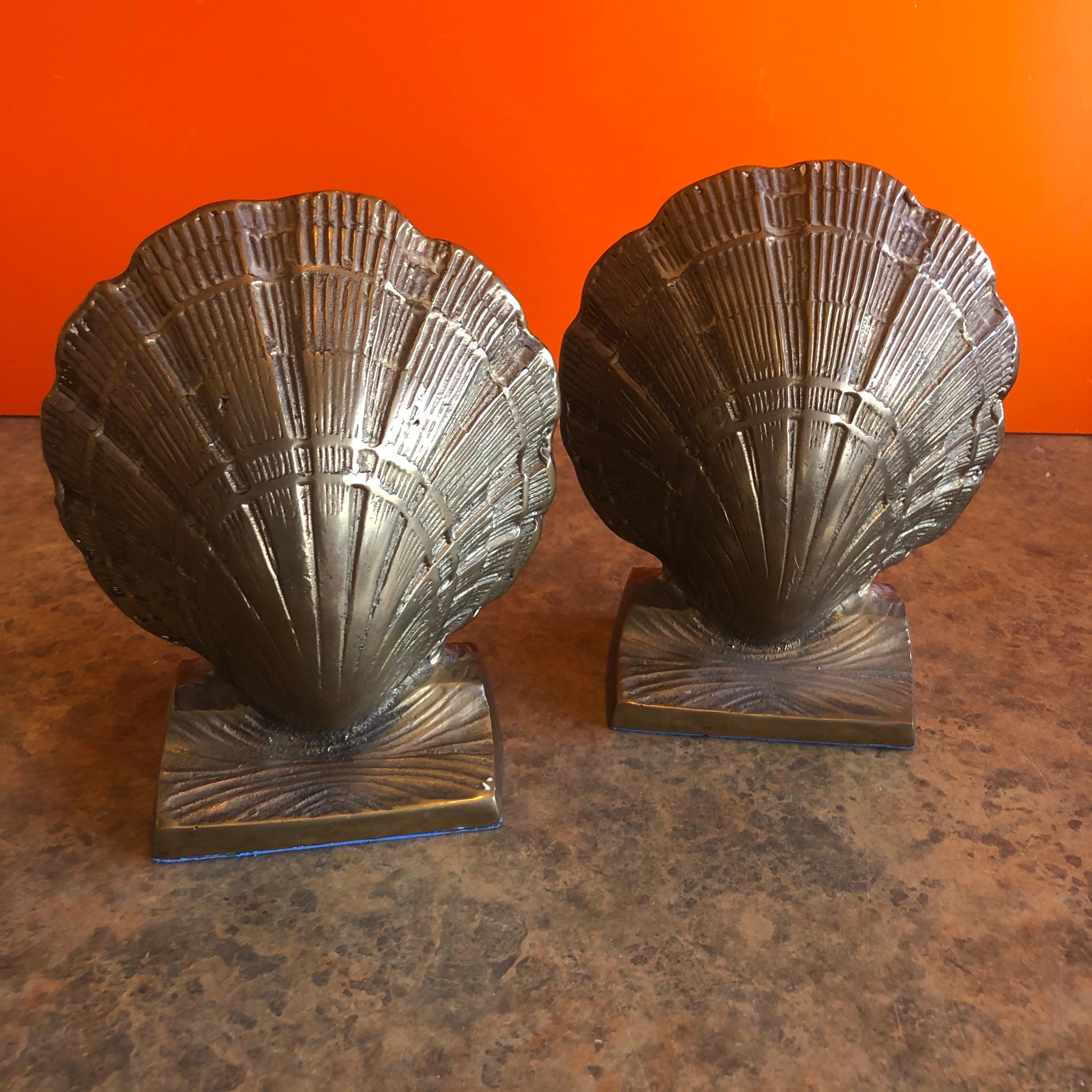 Pair of vintage brass clam shell bookends from Korea, circa 1970s.