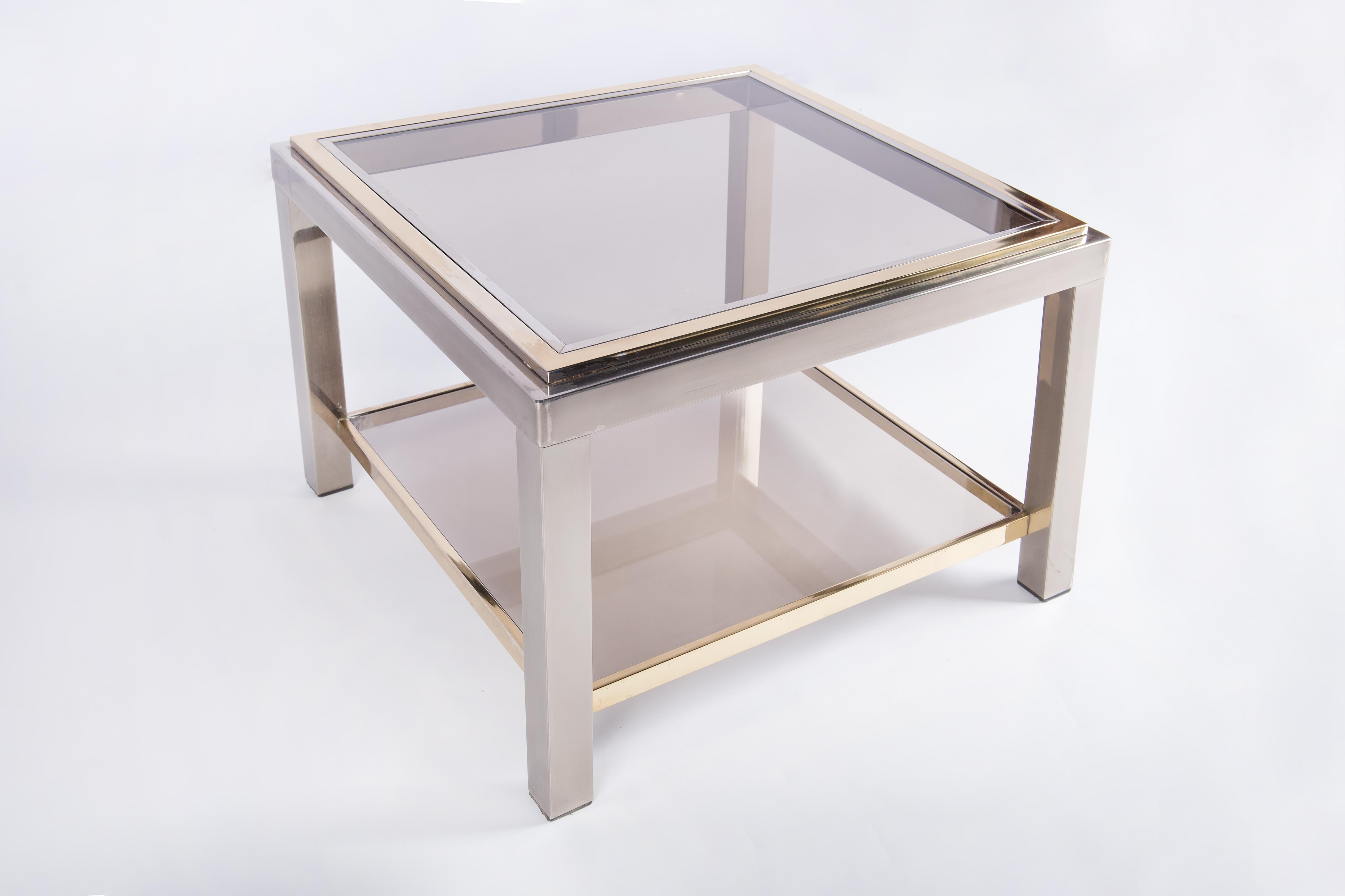 Pair of brass and tempered glass coffee tables from 1980s. They can be used as night stands as well as side tables. French origin.