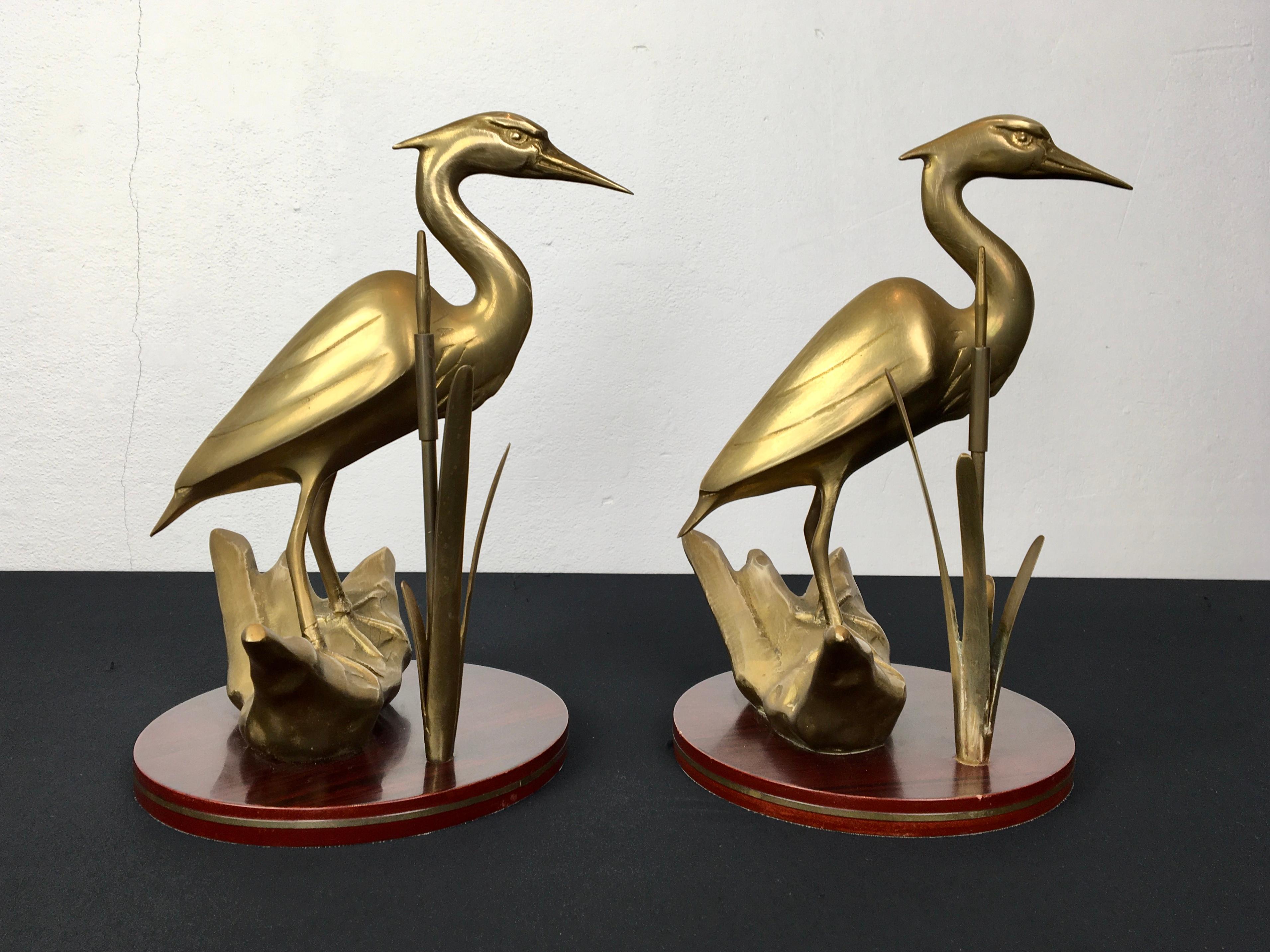 Hollywood Regency Pair of Brass Cranes Sculptures on Wood For Sale