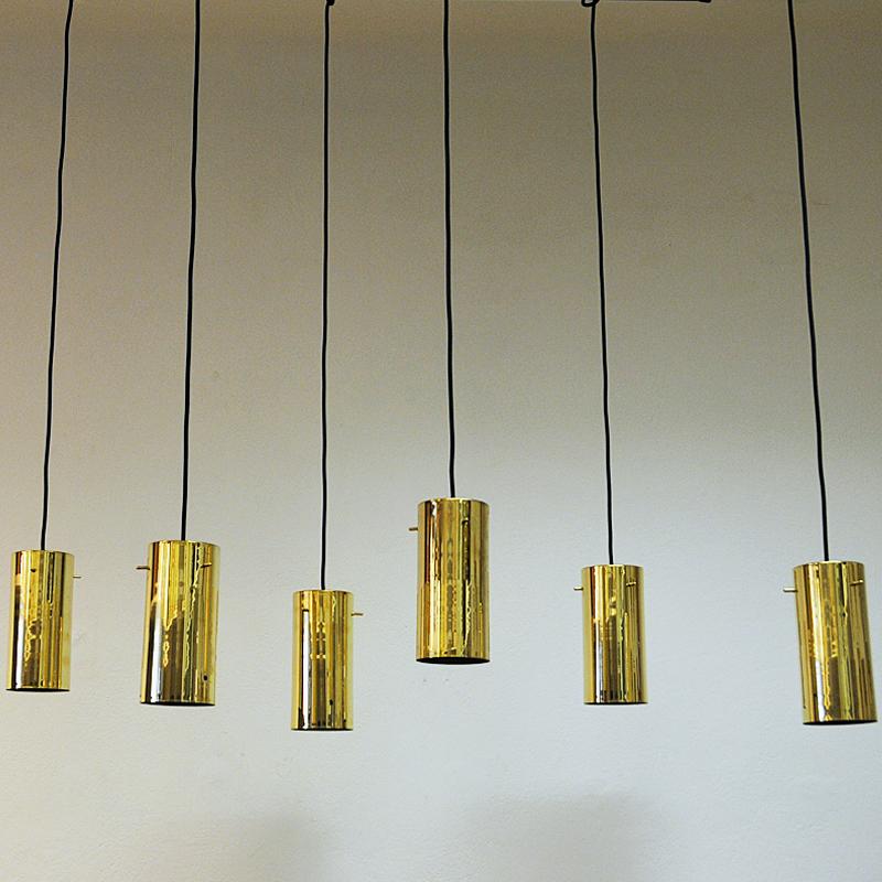 Scandinavian Modern Pair of Brass Cylinder Shaped Ceiling Pendants by Hans A. Jakobsson 1960s Sweden