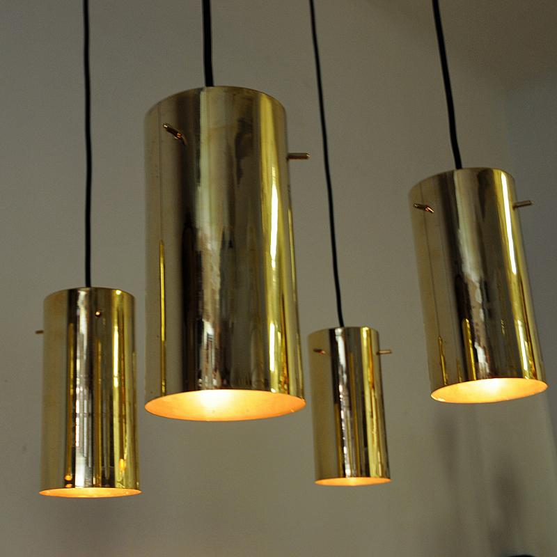 Polished Pair of Brass Cylinder Shaped Ceiling Pendants by Hans A. Jakobsson 1960s Sweden